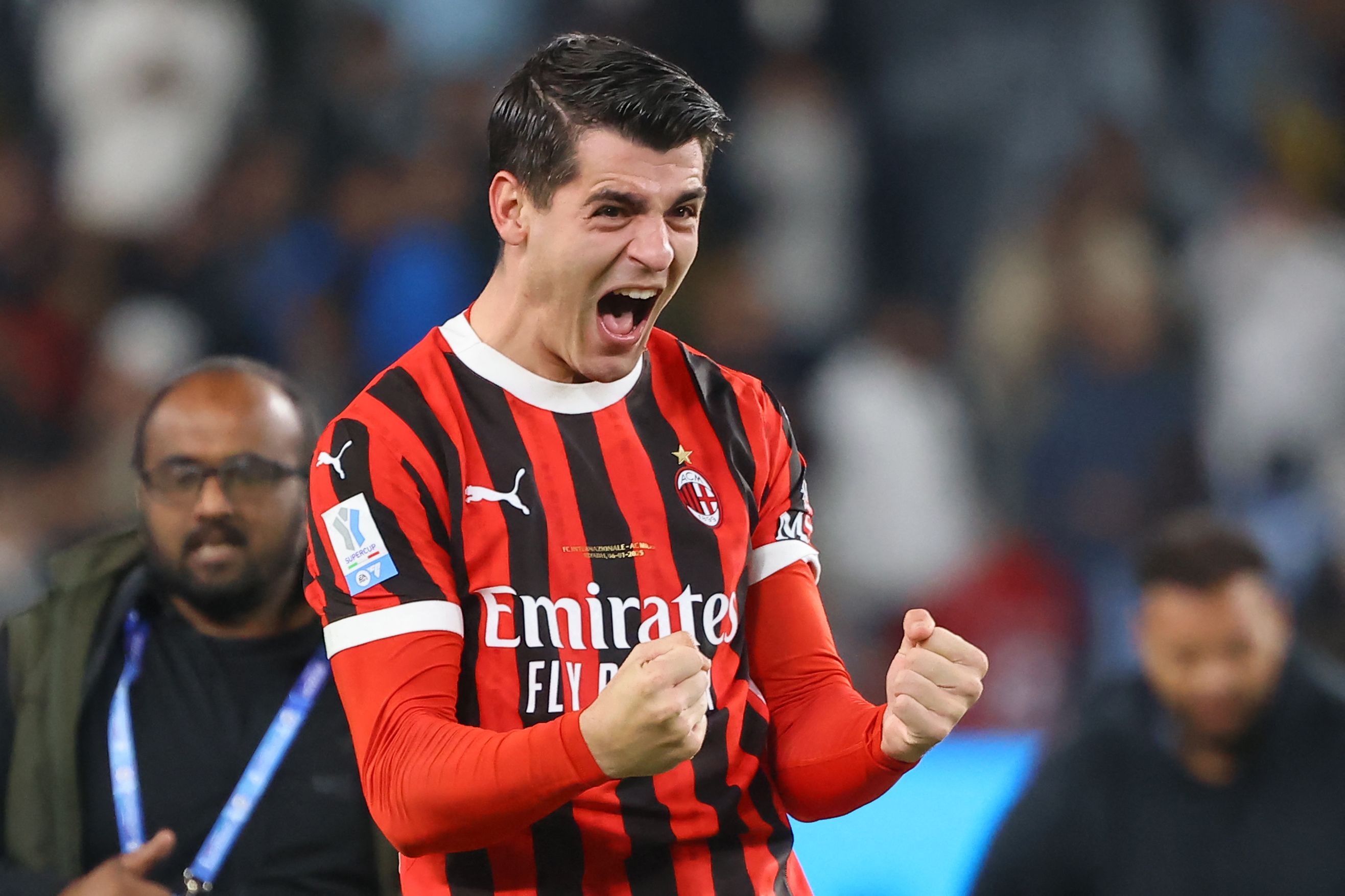 AC Milan's Spanish forward #7 Alvaro Morata celebrates after winning the Italian Super Cup final football match between Inter Milan and AC Milan at the Al-Awwal Park in Riyadh on January 6, 2025. (Photo by Fayez NURELDINE / AFP)