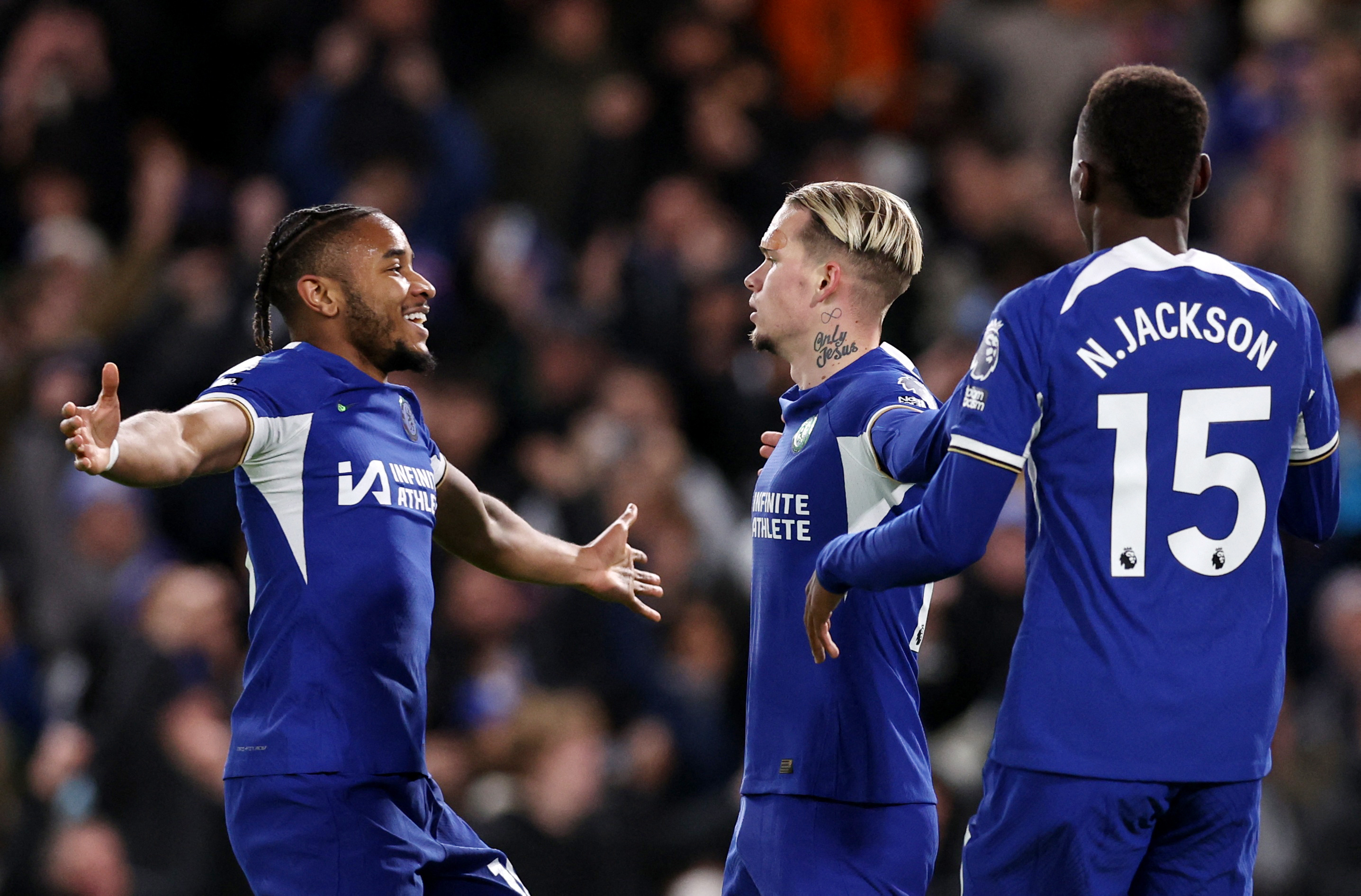 Soccer Football - Premier League - Chelsea v Crystal Palace - Stamford Bridge, London, Britain - December 27, 2023 Chelsea's Mykhailo Mudryk celebrates scoring their first goal with Christopher Nkunku and Nicolas Jackson REUTERS/David Klein NO USE WITH UNAUTHORIZED AUDIO, VIDEO, DATA, FIXTURE LISTS, CLUB/LEAGUE LOGOS OR 'LIVE' SERVICES. ONLINE IN-MATCH USE LIMITED TO 45 IMAGES, NO VIDEO EMULATION. NO USE IN BETTING, GAMES OR SINGLE CLUB/LEAGUE/PLAYER PUBLICATIONS.