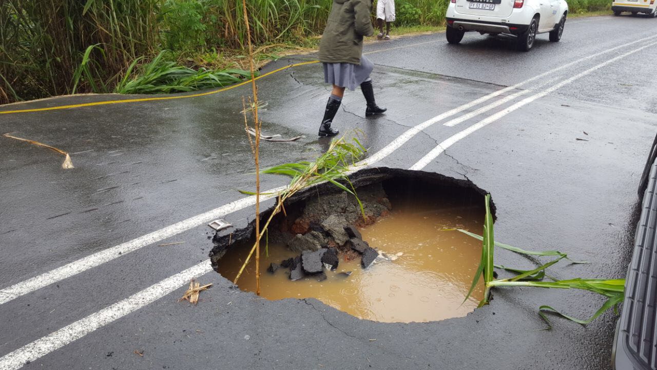 Sinkhole closes road in KZN as heavy rains hit