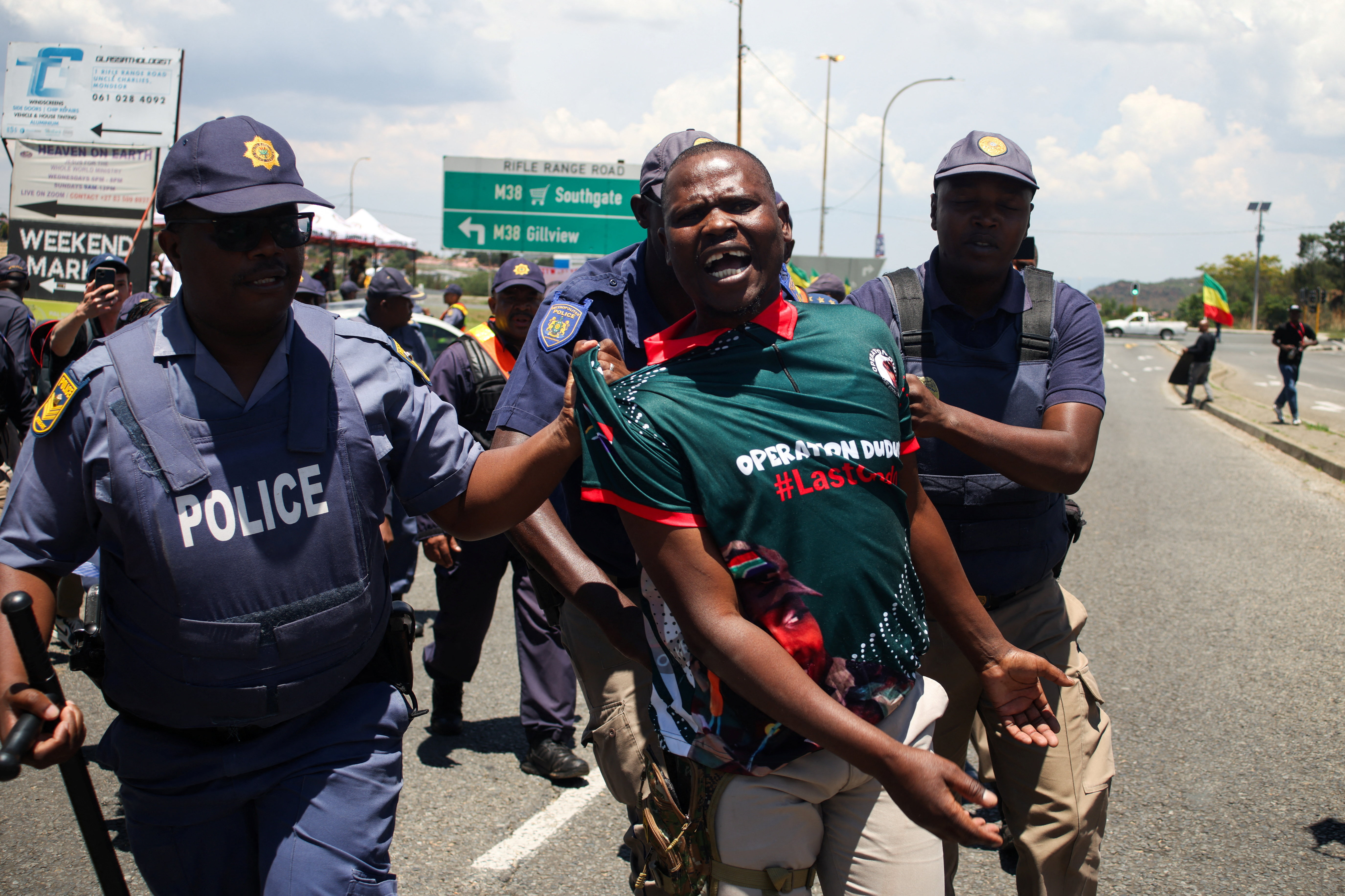 Stun grenades and tear gas fired at Operation Dudula protesters outside G20 summit