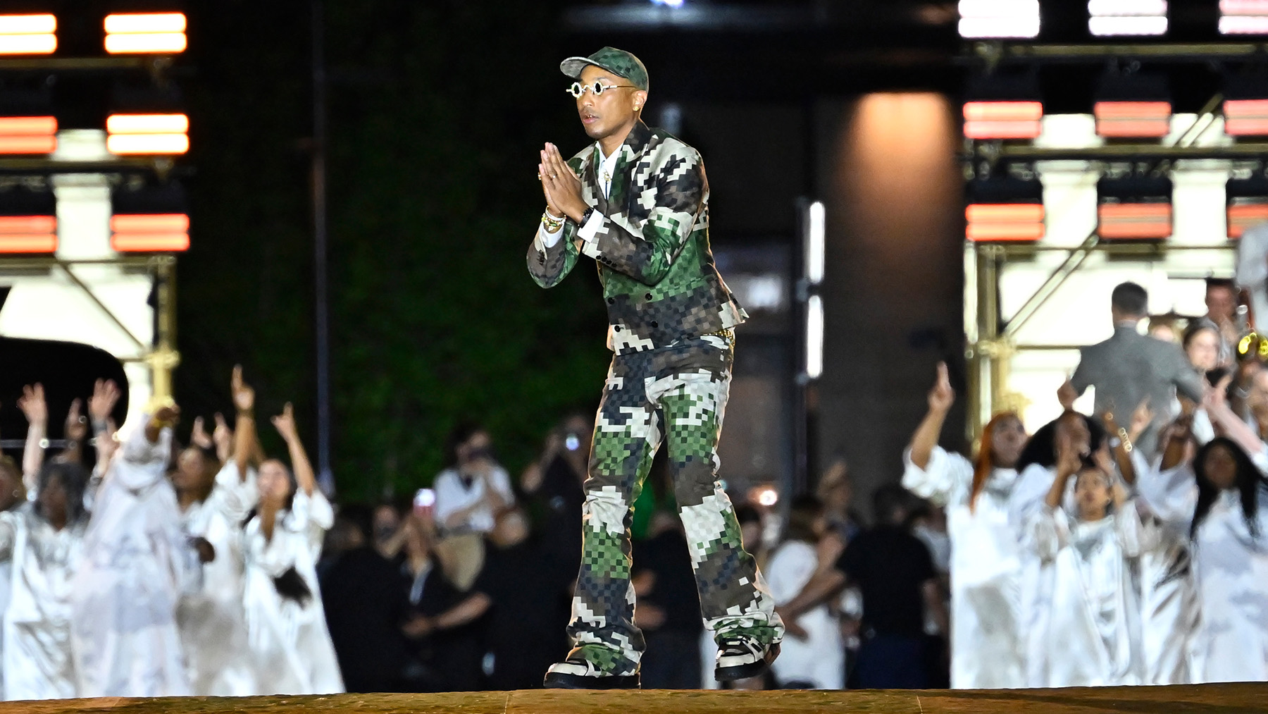 Pharrell Williams Brought a $1 Million Louis Vuitton Bag to Loewe's Fashion  Show