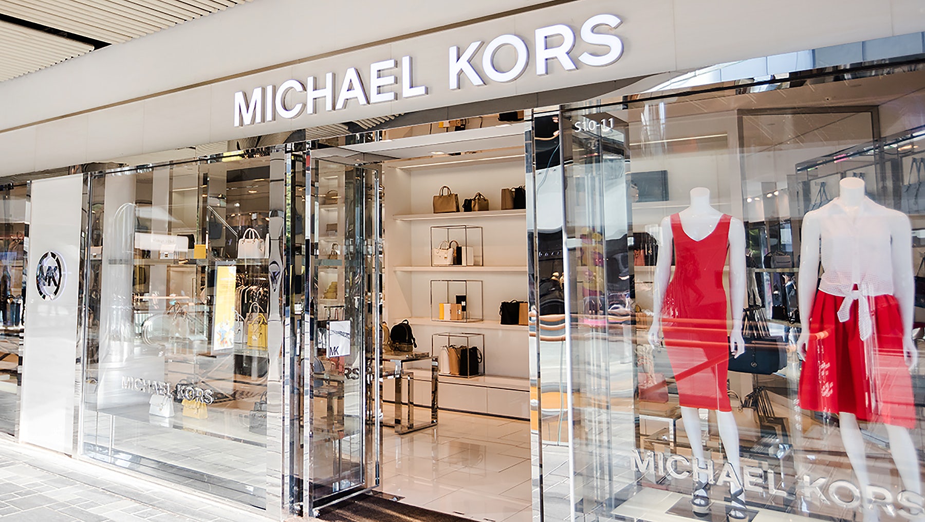 Michael Kors is fed up with department stores damaging its brand
