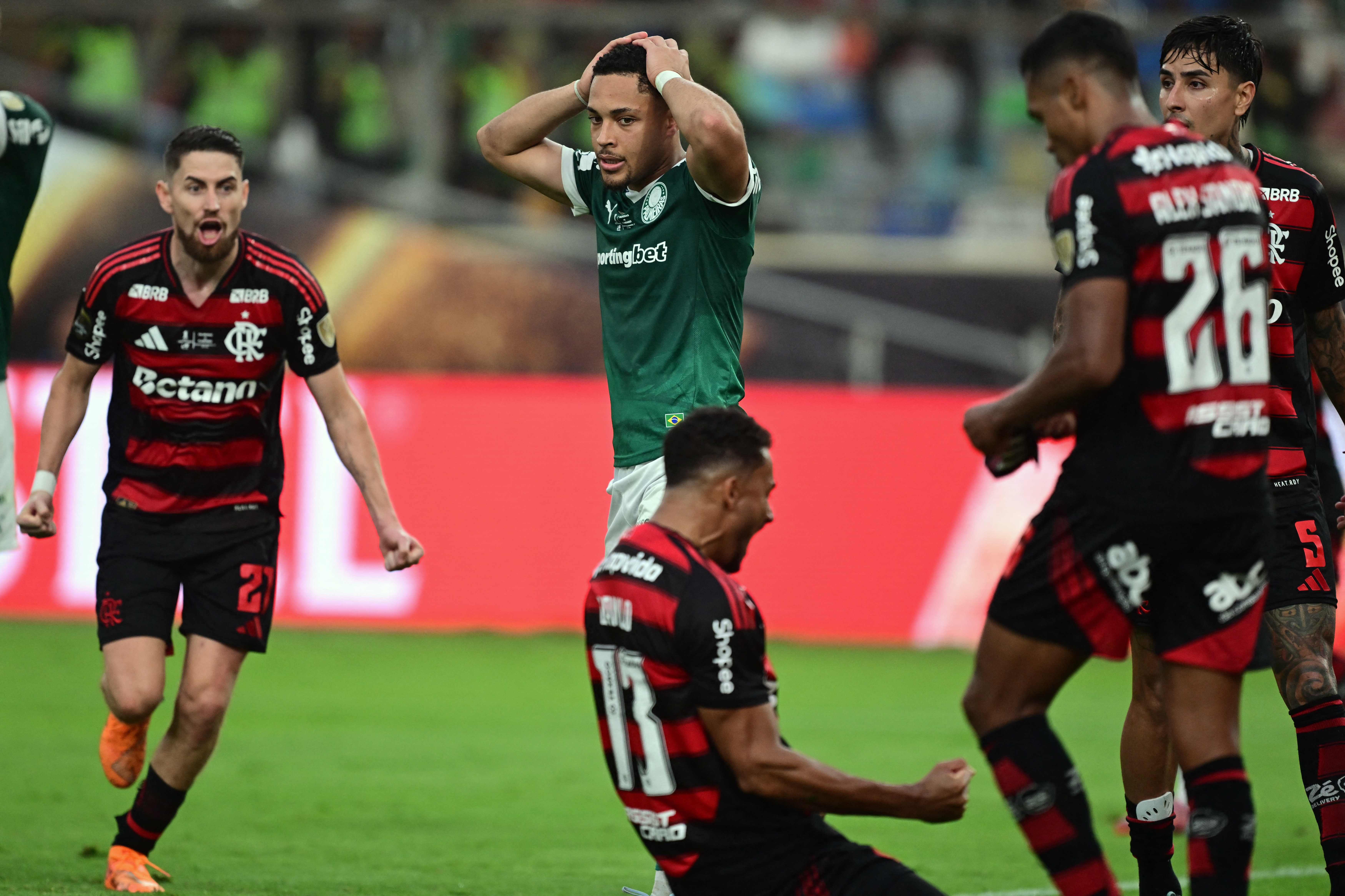 Palmeiras' forward #09 Vitor Roque reacts after Flamengo's defender #13 Danilo first goal during the all Brazilian Copa Libertadores final football match between Palmeiras and Flamengo at Monumental 'U' Marathon stadium in Lima on November 29, 2025. (Photo by ERNESTO BENAVIDES / AFP)