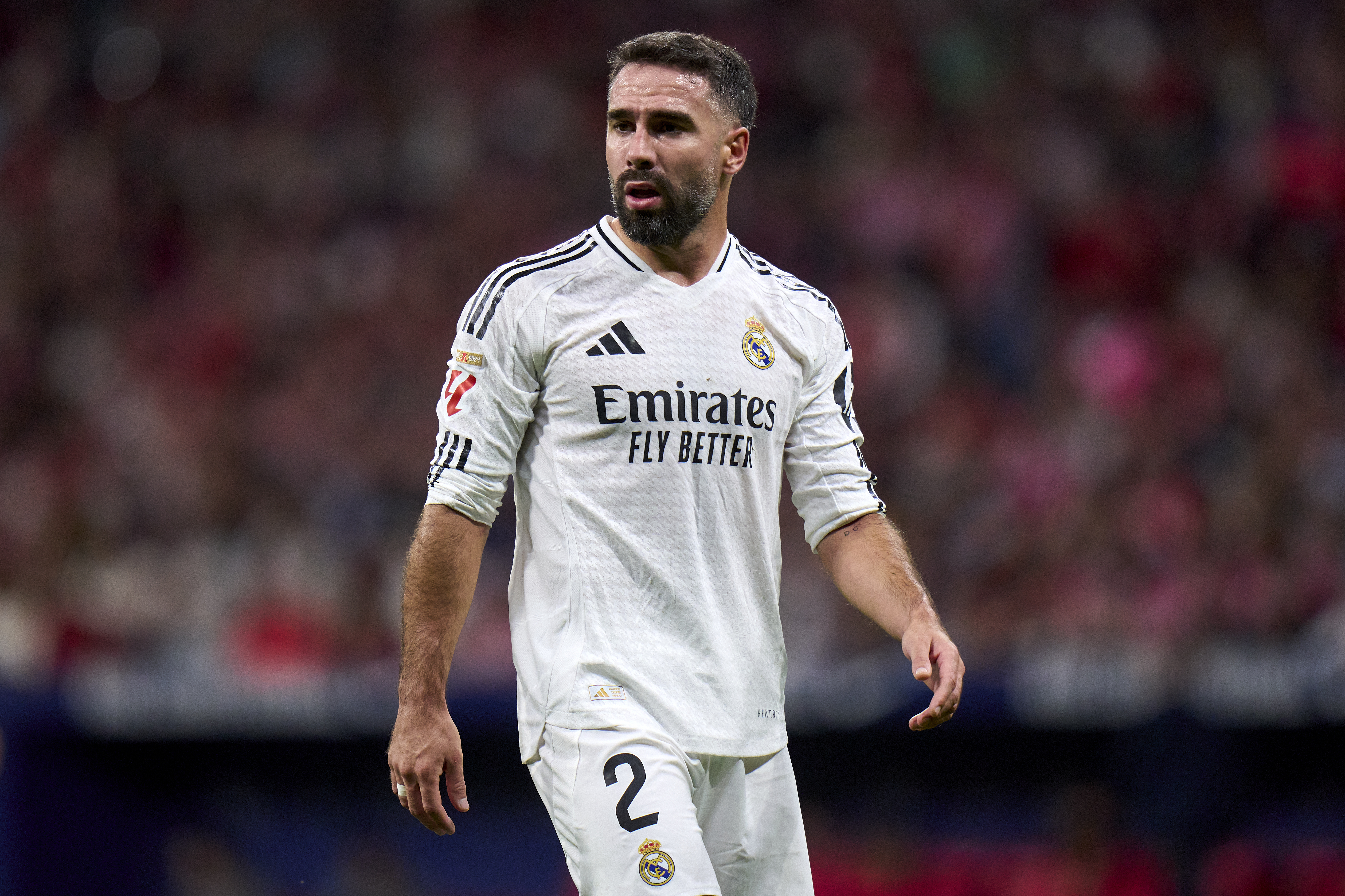 MADRID, SPAIN - SEPTEMBER 29: Dani Carvajal of Real Madrid CF looks on during the LaLiga match between Atletico de Madrid and Real Madrid CF  at Estadio Civitas Metropolitano on September 29, 2024 in Madrid, Spain. (Photo by Diego Souto/Getty Images)