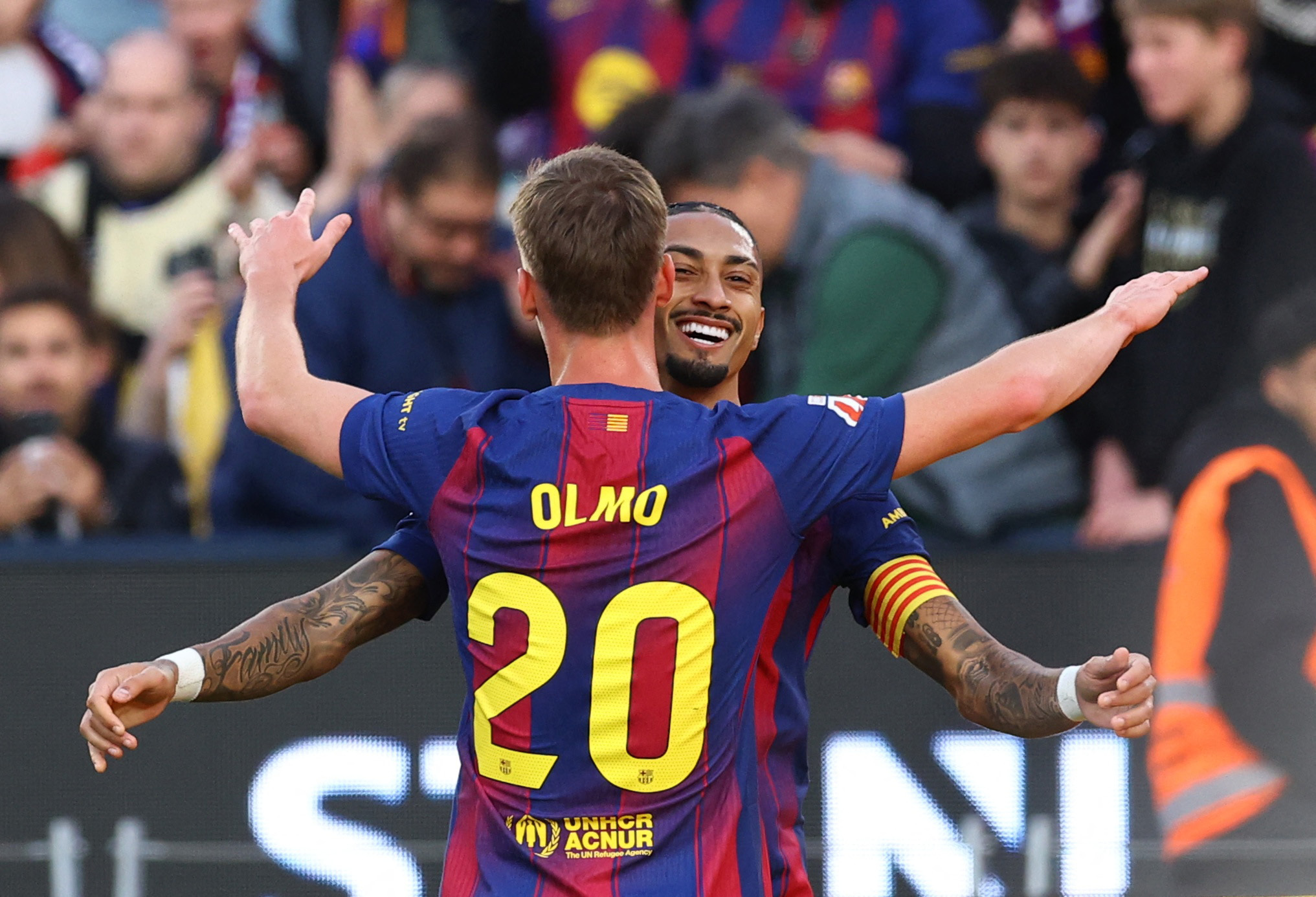 Soccer Football - LaLiga - FC Barcelona v Deportivo Alaves - Spotify Camp Nou, Barcelona, Spain - November 29, 2025 FC Barcelona's Dani Olmo celebrates scoring their second goal with Raphinha REUTERS/Albert Gea