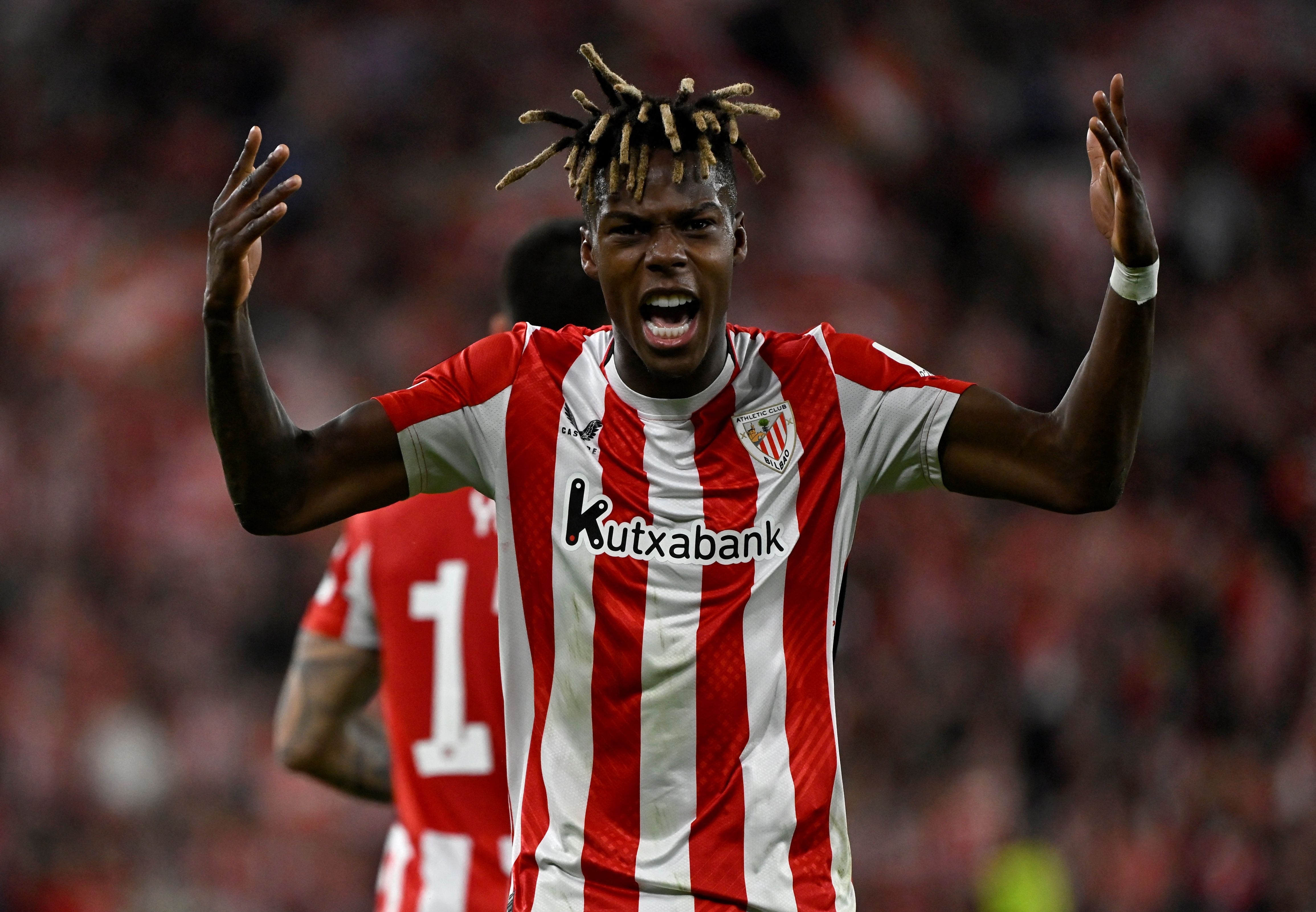 Athletic Bilbao's Spanish forward #10 Nico Williams celebrates scoring his team's first goal during the UEFA Europa League last 16 second leg football match between Athletic Club Bilbao and AS Roma at the San Mames stadium in Bilbao, on March 13, 2025. (Photo by ANDER GILLENEA / AFP)