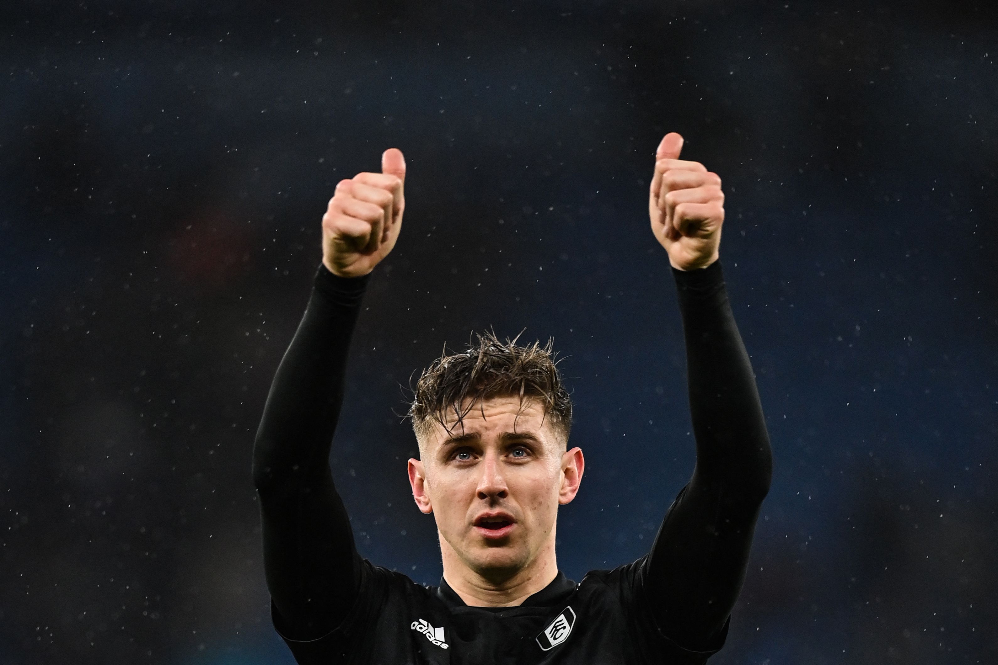 Fulham's English midfielder Tom Cairney reacts at the end of the English FA Cup fourth round football match between Manchester City and Fulham at the Etihad Stadium in Manchester, north west England, on February 5, 2022. (Photo by Paul ELLIS / AFP) / RESTRICTED TO EDITORIAL USE. No use with unauthorized audio, video, data, fixture lists, club/league logos or 'live' services. Online in-match use limited to 120 images. An additional 40 images may be used in extra time. No video emulation. Social media in-match use limited to 120 images. An additional 40 images may be used in extra time. No use in betting publications, games or single club/league/player publications. / 