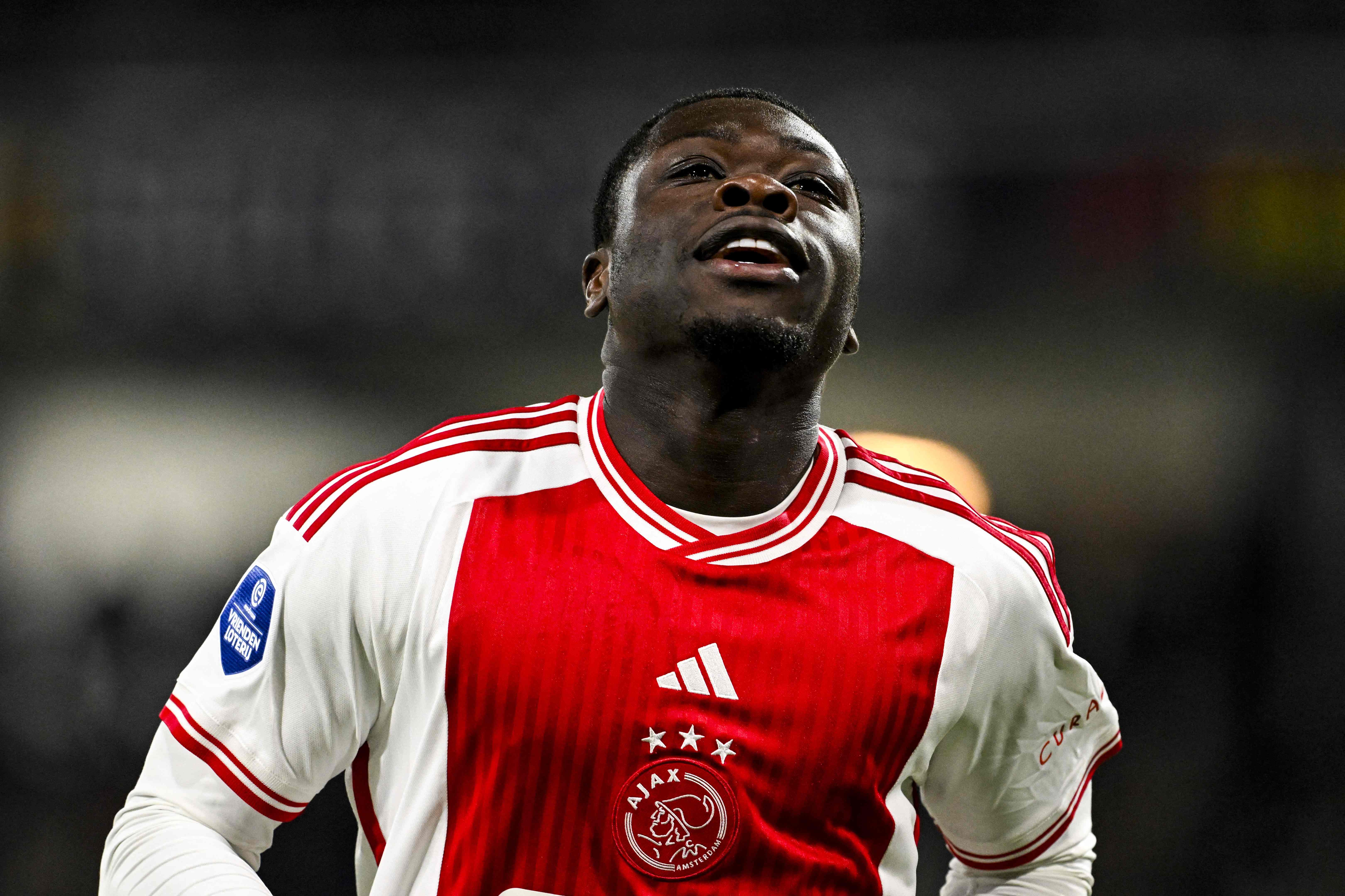 Ajax's Brian Brobbey celebrates after scoring a goal during the Dutch Eredivisie footbal match between Heracles Almelo and AFC Ajax Amsterdam at the Erve Asito stadium on January 27, 2024 in Almelo. (Photo by Olaf Kraak / ANP / AFP) / Netherlands OUT