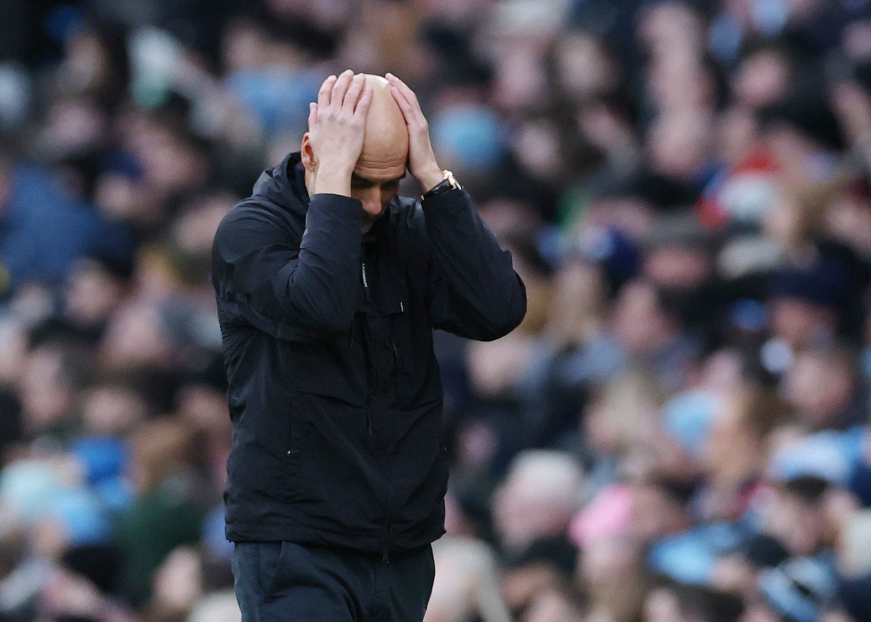 Soccer Football - Premier League - Manchester City v Wolverhampton Wanderers - Etihad Stadium, Manchester, Britain - January 24, 2026  Manchester City manager Pep Guardiola reacts REUTERS/Phil Noble EDITORIAL USE ONLY. NO USE WITH UNAUTHORIZED AUDIO, VIDEO, DATA, FIXTURE LISTS, CLUB/LEAGUE LOGOS OR 'LIVE' SERVICES. ONLINE IN-MATCH USE LIMITED TO 120 IMAGES, NO VIDEO EMULATION. NO USE IN BETTING, GAMES OR SINGLE CLUB/LEAGUE/PLAYER PUBLICATIONS. PLEASE CONTACT YOUR ACCOUNT REPRESENTATIVE FOR FURTHER DETAILS..