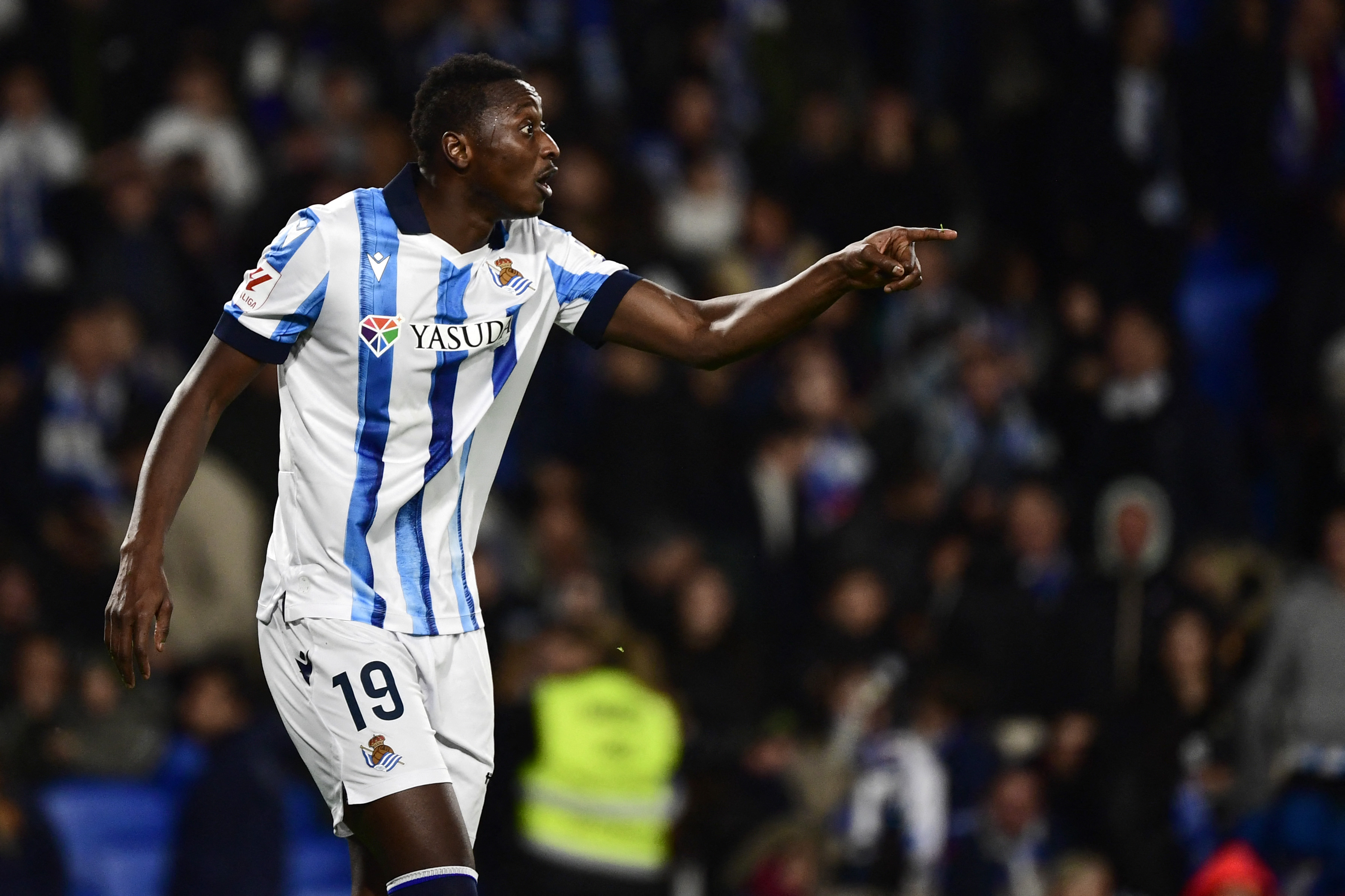 Real Sociedad's Nigerian forward #19 Umar Sadiq gestures during the Spanish league football match between Real Sociedad and Real Betis at the Anoeta stadium in San Sebastian on December 17, 2023. (Photo by ANDER GILLENEA / AFP)