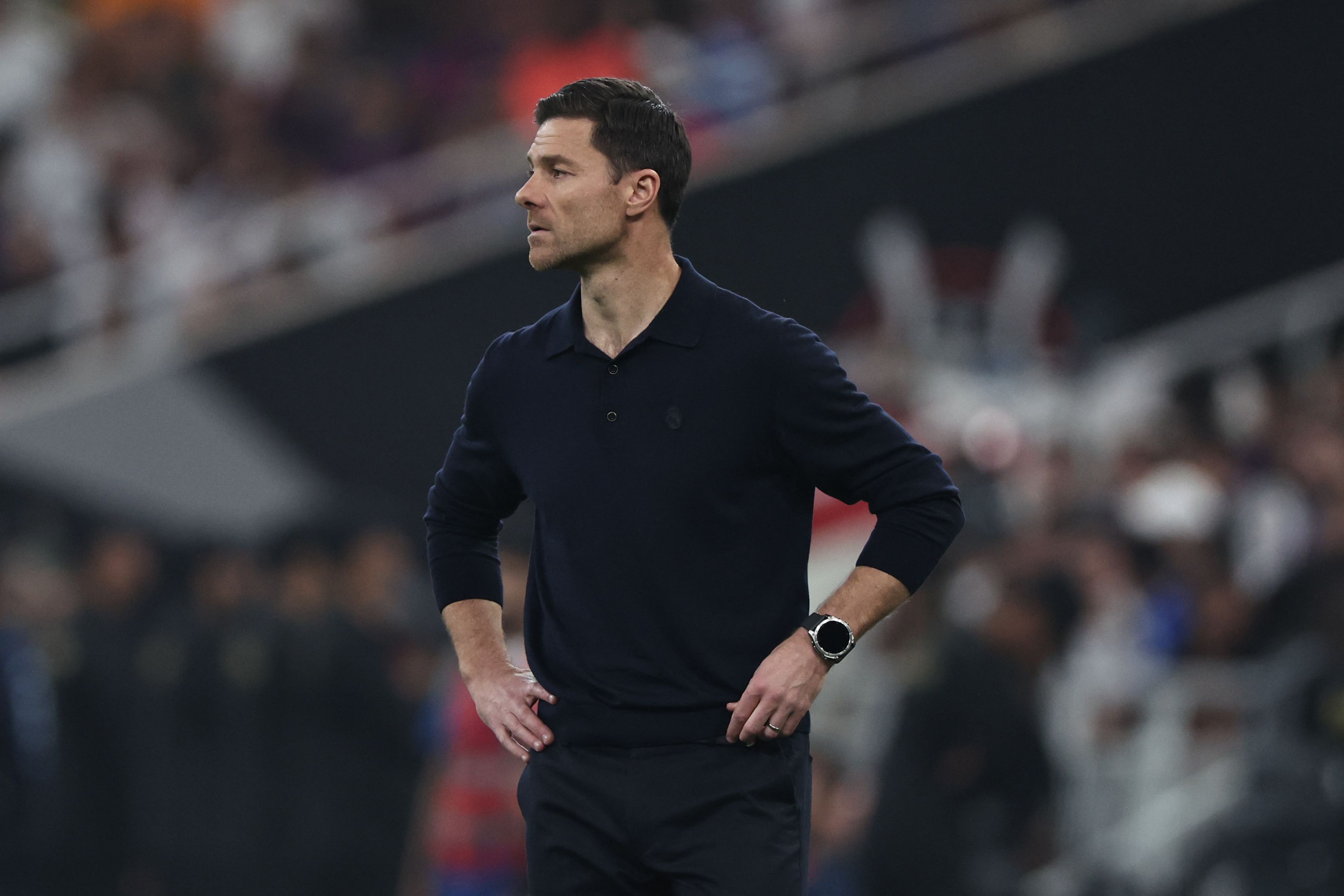 Real Madrid's Spanish coach Xabi Alonso reacts during the Spanish Super Cup final football match between FC Barcelona and Real Madrid at the King Abdullah Stadium�in Jeddah on January 11, 2026. Real Madrid appointed Alvaro Arbeloa as new coach on January 12, 2026 after coach Xabi Alonso has left the club by mutual consent, a day after the team lost the Spanish Super Cup final against rivals Barcelona, AFP reports. (Photo by Fadel SENNA / AFP)