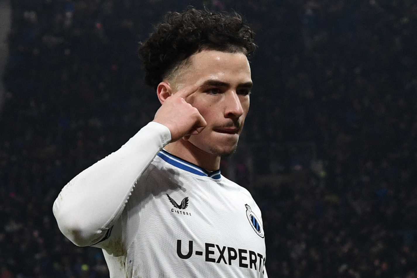 Club Brugge's Belgian midfielder #68 Chemsdine Talbi celebrates scoring his team's second goal during the UEFA Champions League knockout phase play-off 2nd leg football match between Club Brugge KV and Atalanta at the Stadio di Bergamo in Bergamo on February 18, 2025. (Photo by Isabella BONOTTO / AFP)