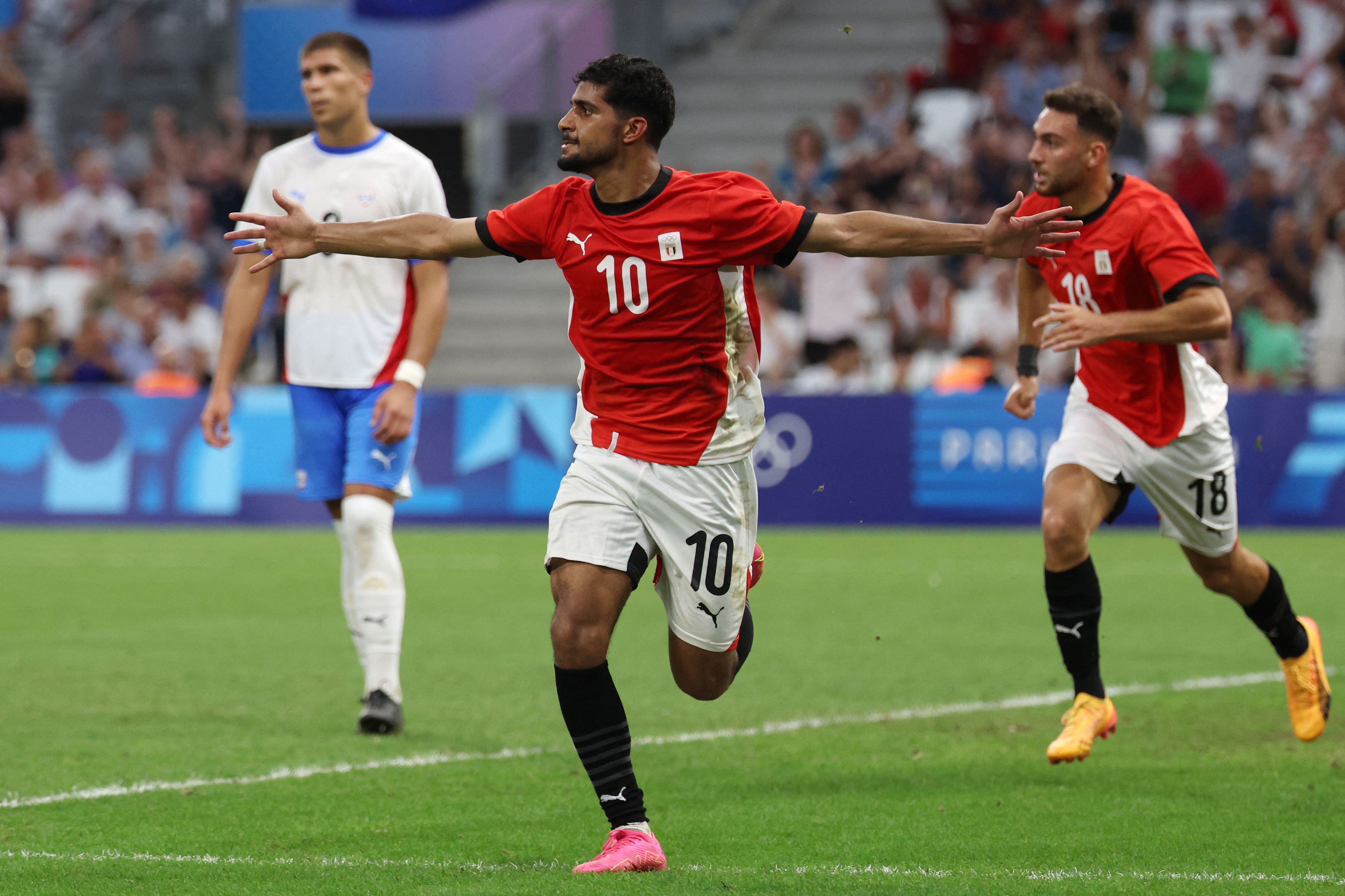 Egypt's midfielder #10 Ibrahim Adel celebrates scoring the equalizing goal in the men's quarter-final football match between Egypt and Paraguay during the Paris 2024 Olympic Games at the Marseille Stadium in Marseille on August 2, 2024. (Photo by Pascal GUYOT / AFP)