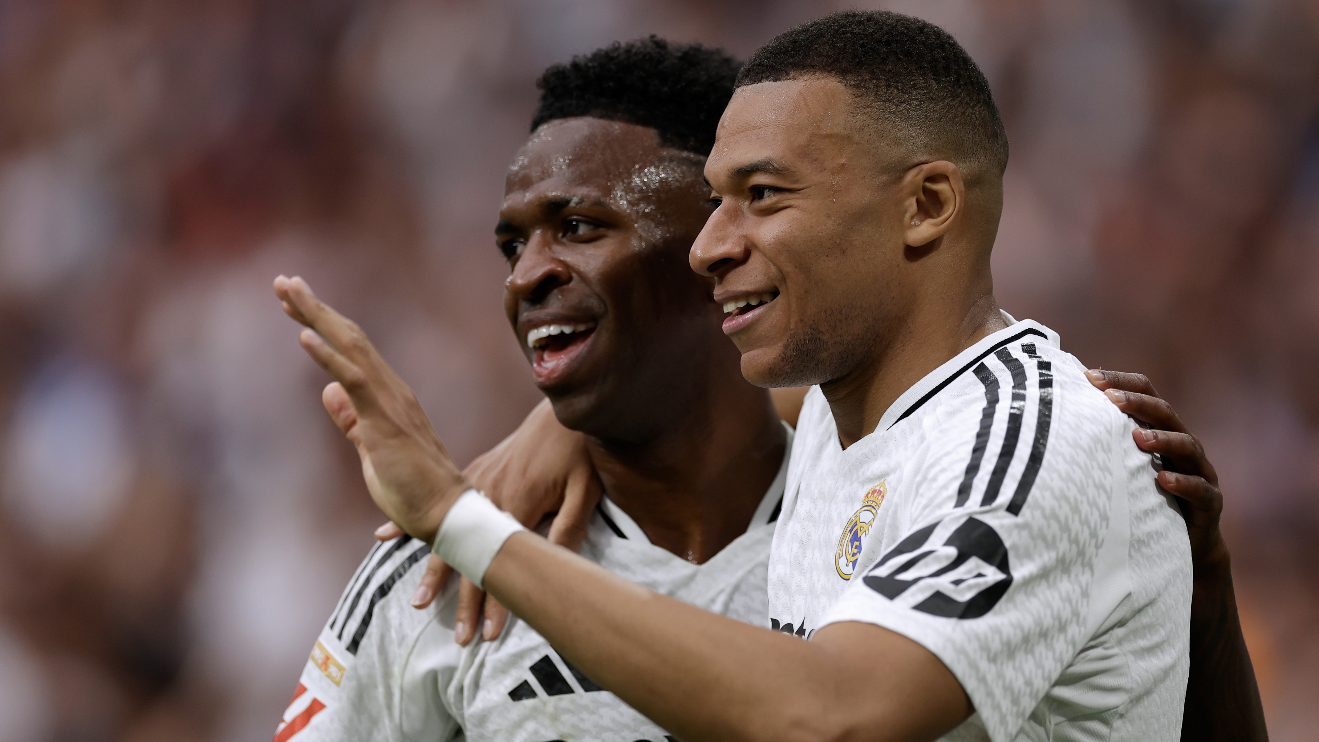 MADRID, SPAIN - MAY 24: (L-R) Vinicius Junior of Real Madrid , Kylian Mbappe of Real Madrid celebrate 2-0 during the LaLiga EA Sports  match between Real Madrid v Real Sociedad at the Estadio Santiago Bernabeu on May 24, 2025 in Madrid Spain (Photo by Maria Gracia Jimenez/Soccrates/Getty Images)