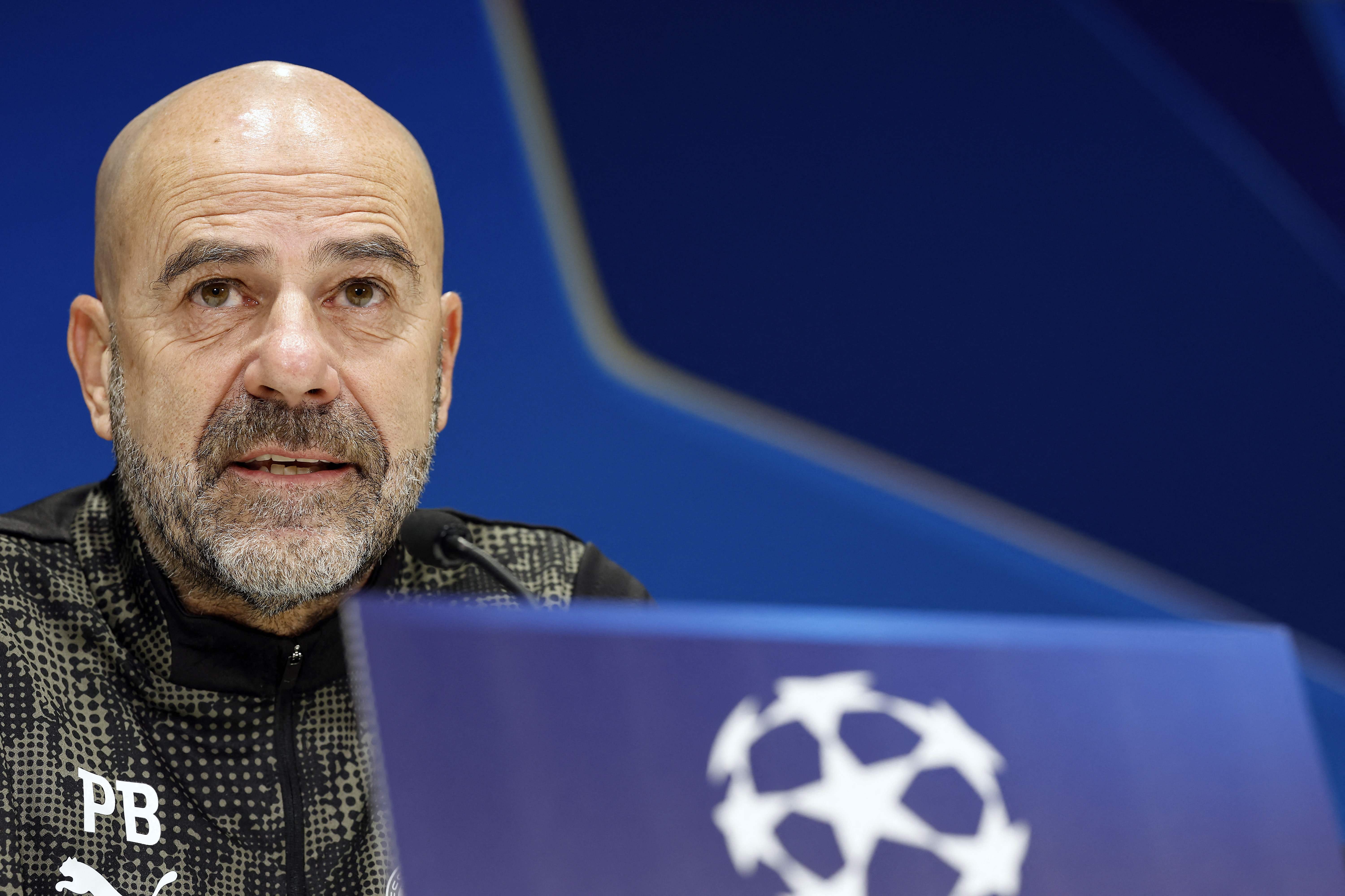 PSV Eindhoven's Dutch coach Peter Bosz speaks during a press conference on the eve of the UEFA Champions League, league phase day 6 match between PSV Eindhoven and Atletico de Madrid at the Phillips Stadium, in Eindhoven on December 8, 2025. (Photo by MAURICE VAN STEEN / ANP / AFP) / Netherlands OUT