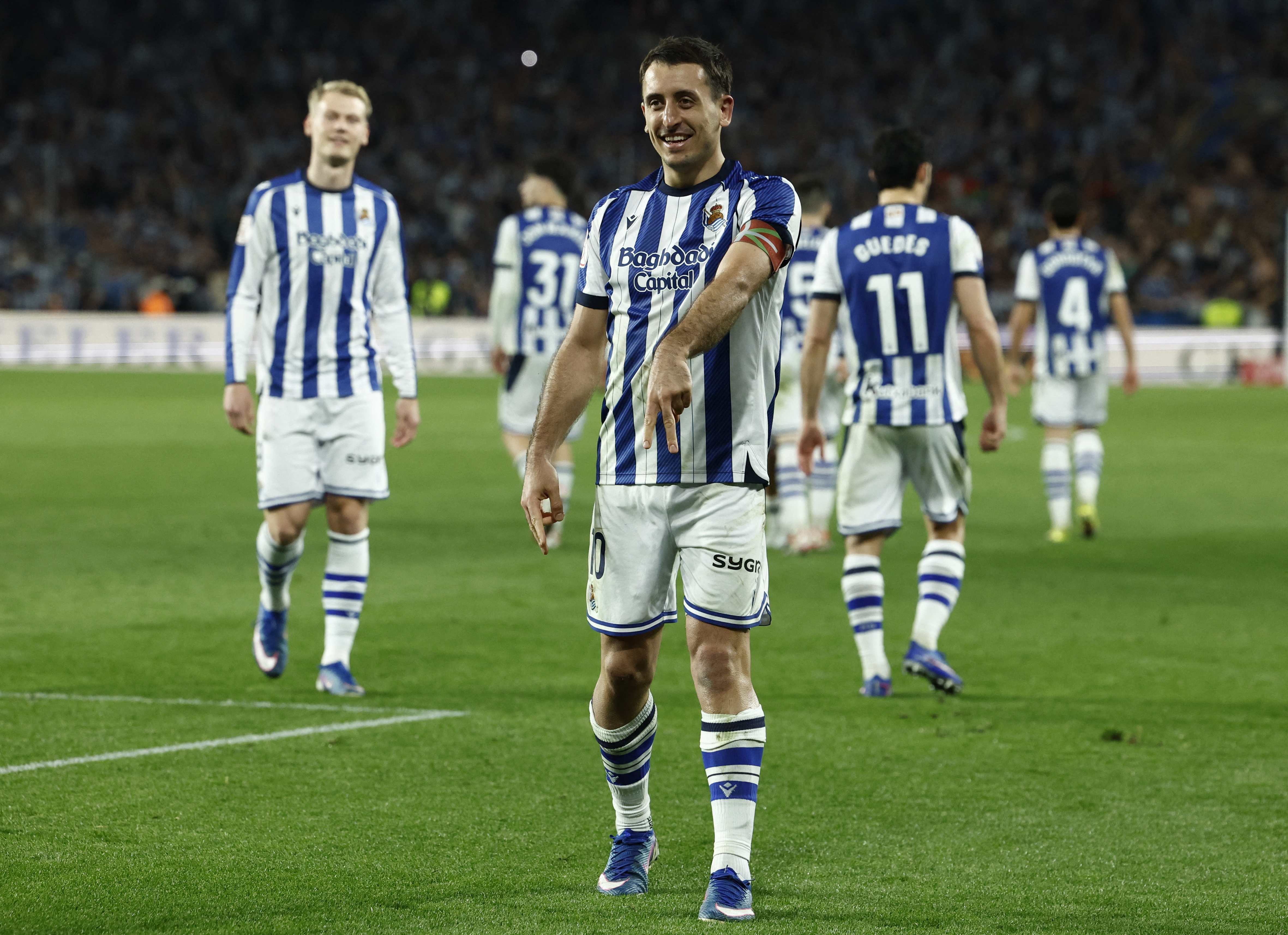 Soccer Football - Copa del Rey - Semi Final - Second Leg - Real Sociedad v Athletic Bilbao - Reale Arena, San Sebastian, Spain - March 4, 2026 Real Sociedad's Mikel Oyarzabal celebrates scoring their first goal REUTERS/Vincent West