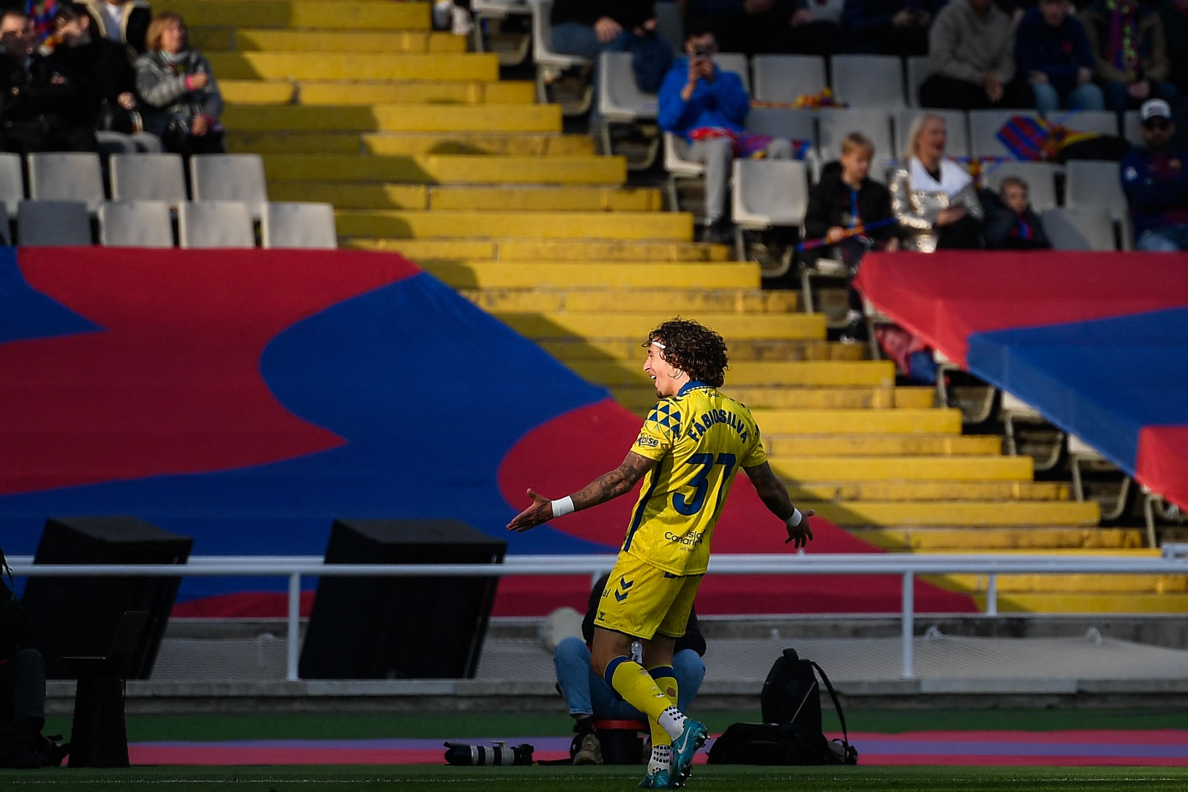 Las Palmas' Portuguese forward #37 Fabio Silva celebrates after scoring their second goal during the Spanish league football match between FC Barcelona and UD Las Palmas at the Estadi Olimpic Lluis Companys in Barcelona on November 30, 2024. (Photo by Josep LAGO / AFP)