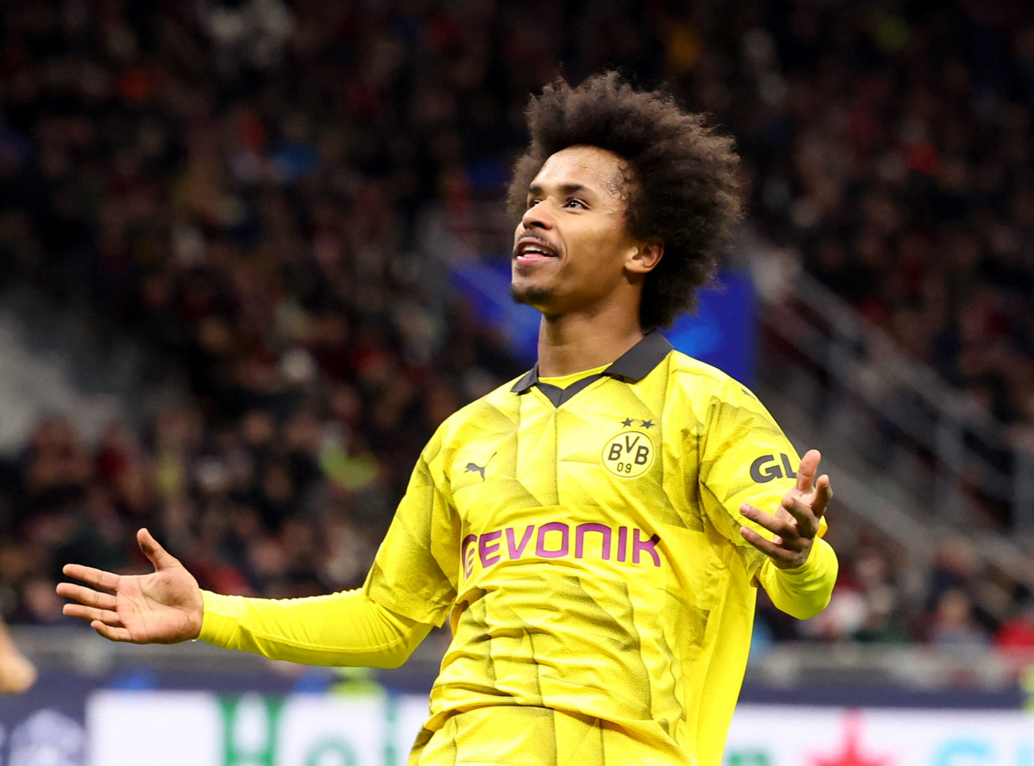 Soccer Football - Champions League - Group F - AC Milan v Borussia Dortmund - San Siro, Milan, Italy - November 28, 2023  Borussia Dortmund's Karim Adeyemi celebrates scoring their third goal REUTERS/Claudia Greco