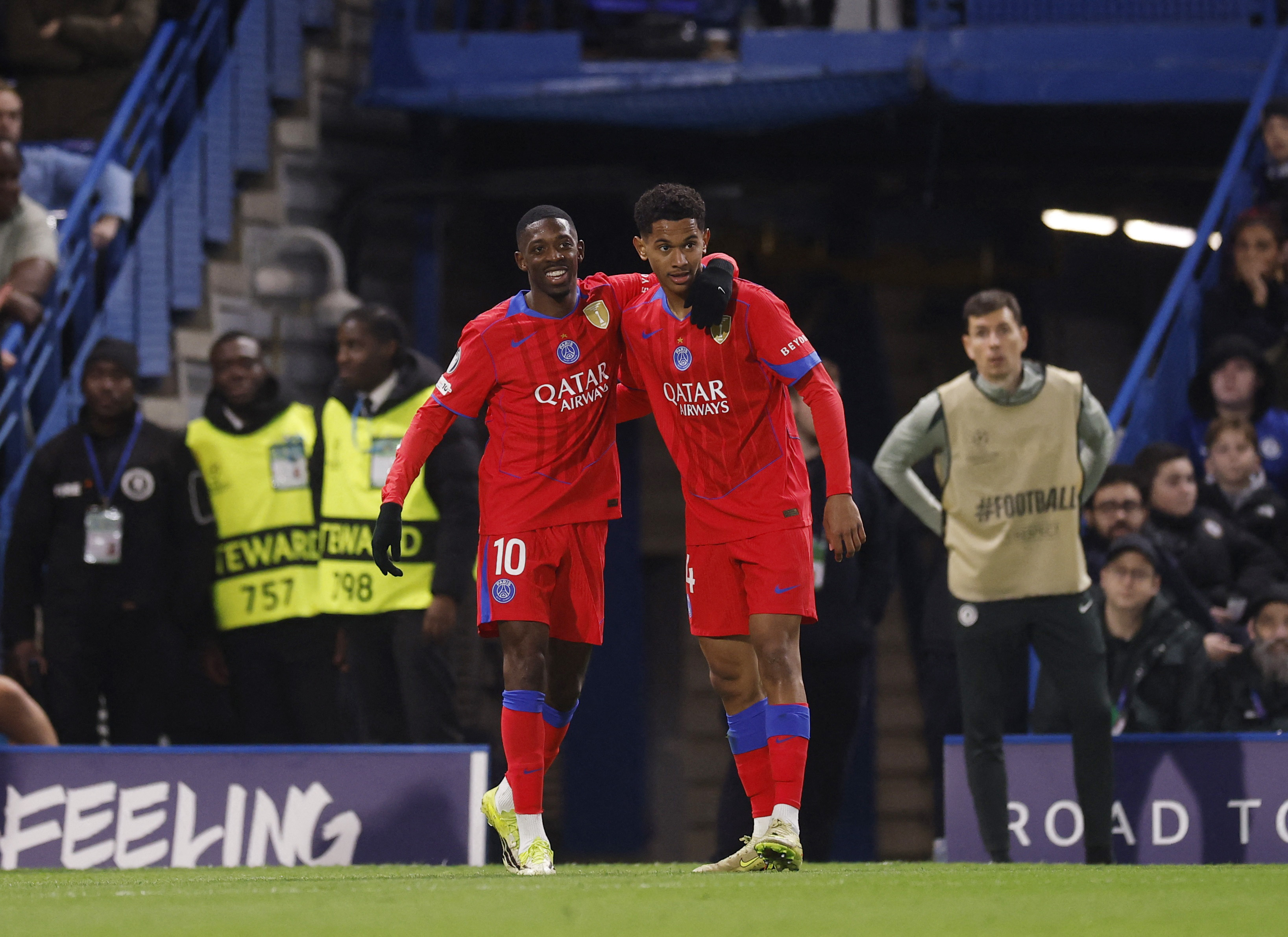 Soccer Football - UEFA Champions League - Round 16 - Second Leg - Chelsea v Paris St Germain - Stamford Bridge, London, Britain - March 17, 2026 Paris St Germain's Senny Mayulu celebrates scoring their third goal with Ousmane Dembele Action Images via Reuters/Andrew Couldridge