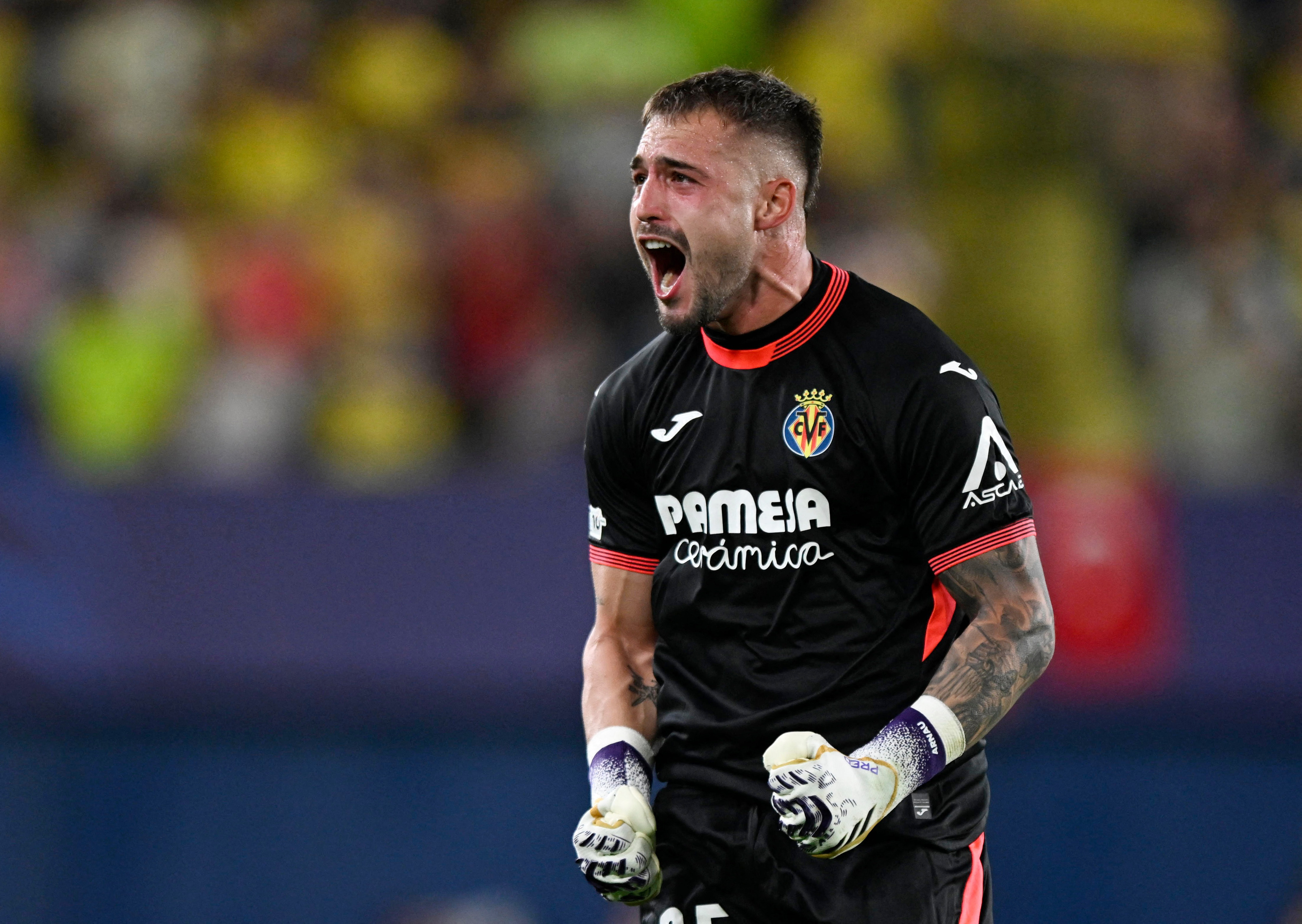Soccer Football - UEFA Champions League - Villarreal v Juventus - Estadio de la Ceramica, Villarreal, Spain - October 1, 2025 Villarreal's Arnau Tenas reacts REUTERS/Pablo Morano