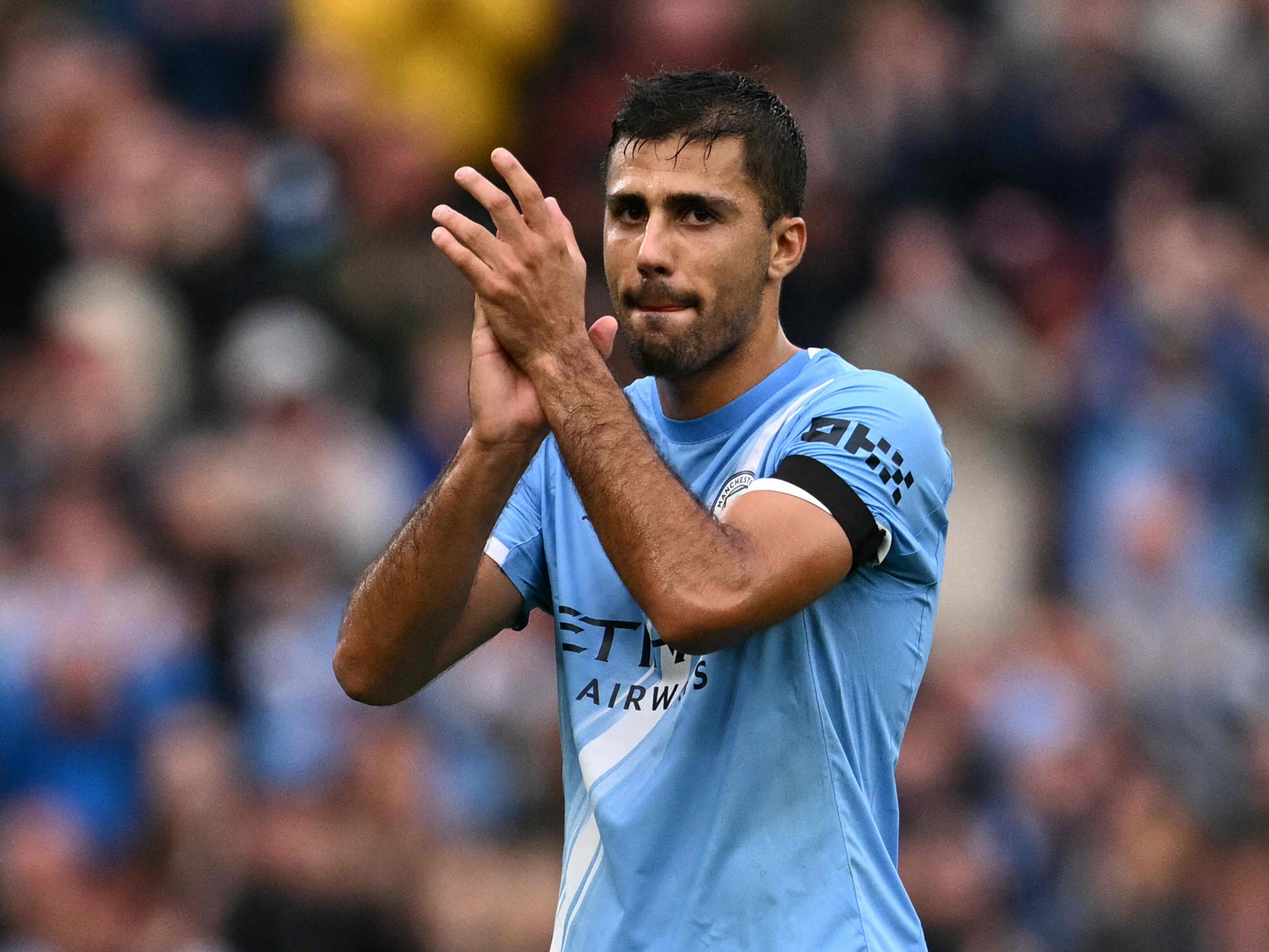 Manchester City's Spanish midfielder #16 Rodri applauds as he leaves the pitch substituted during the English Premier League football match between Manchester City and Manchester United at the Etihad Stadium in Manchester, north west England, on September 14, 2025. (Photo by Oli SCARFF / AFP) / RESTRICTED TO EDITORIAL USE. No use with unauthorized audio, video, data, fixture lists, club/league logos or 'live' services. Online in-match use limited to 120 images. An additional 40 images may be used in extra time. No video emulation. Social media in-match use limited to 120 images. An additional 40 images may be used in extra time. No use in betting publications, games or single club/league/player publications. /
