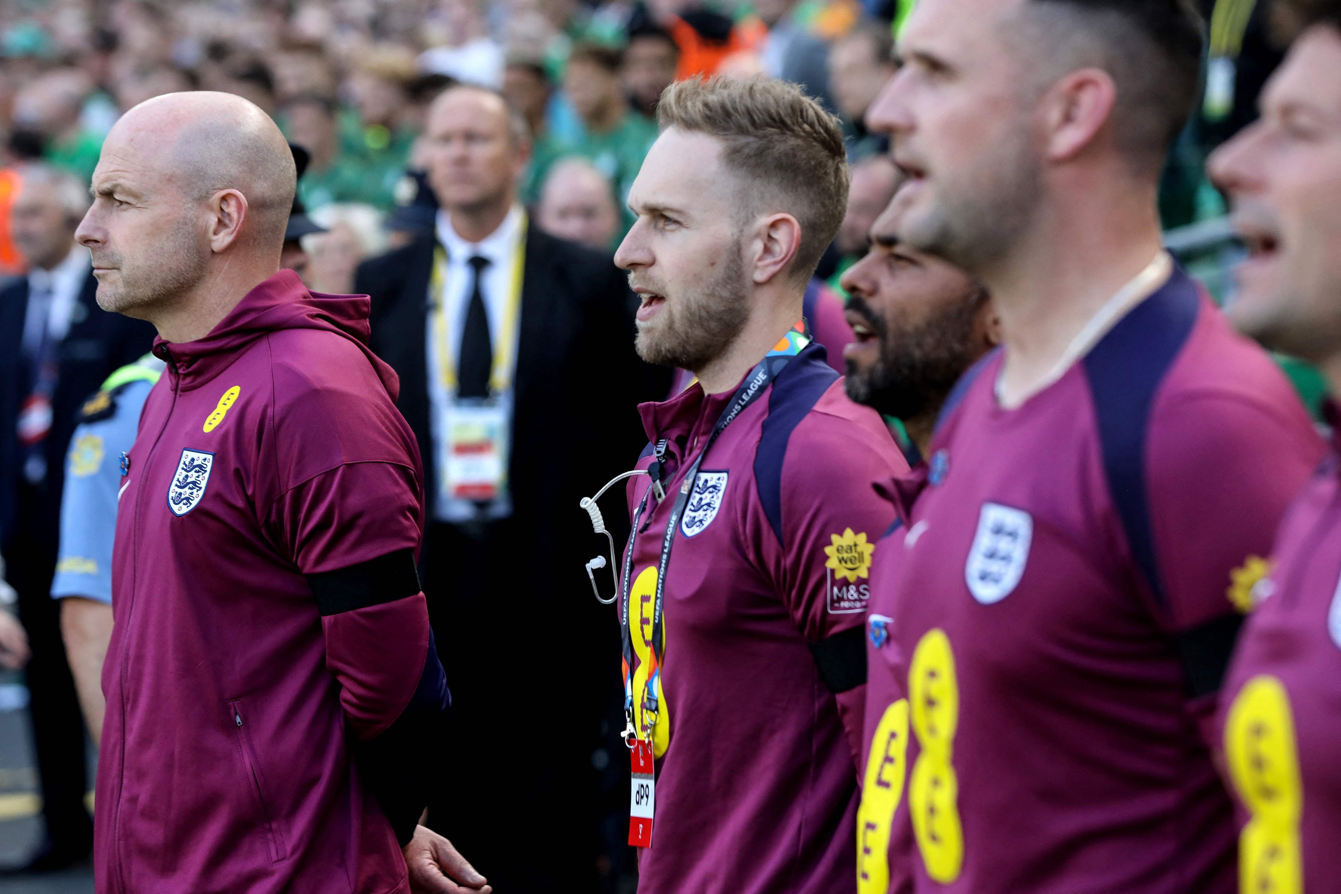 England's interim manager Lee Carsley listens to the national anthem during the UEFA Nations League, League B, group 2, football match between Ireland and England at the Aviva Stadium, in Dublin, on September 7, 2024. (Photo by PAUL FAITH / AFP)