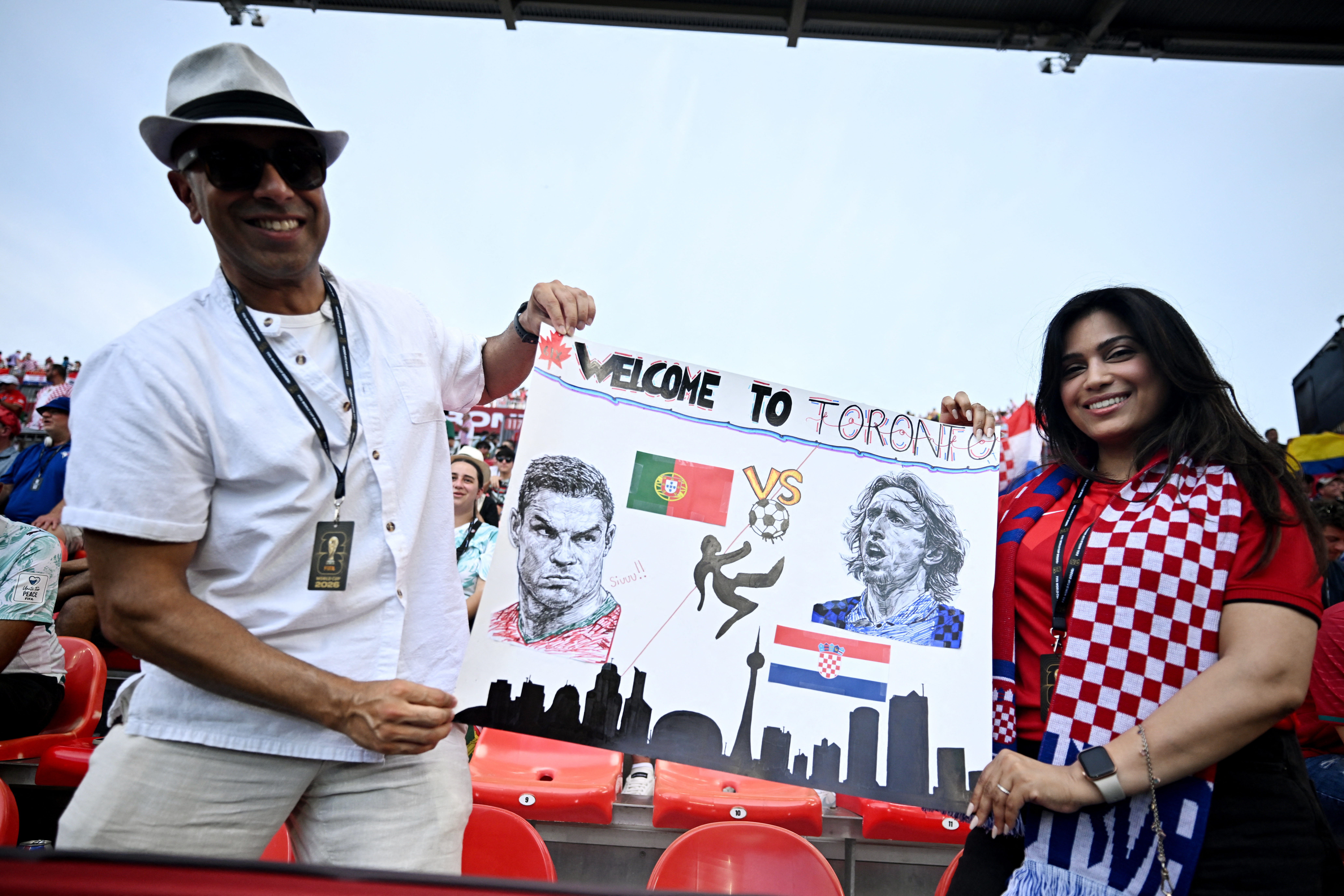 Soccer Football - FIFA World Cup 2026 - Round of 32 - Portugal v Croatia - Toronto Stadium, Toronto, Canada - July 2, 2026 Fans hold up a welcome to Toronto sign for Portugal's Cristiano Ronaldo and Croatia's Luka Modric inside the stadium before the match REUTERS/Dylan Martinez