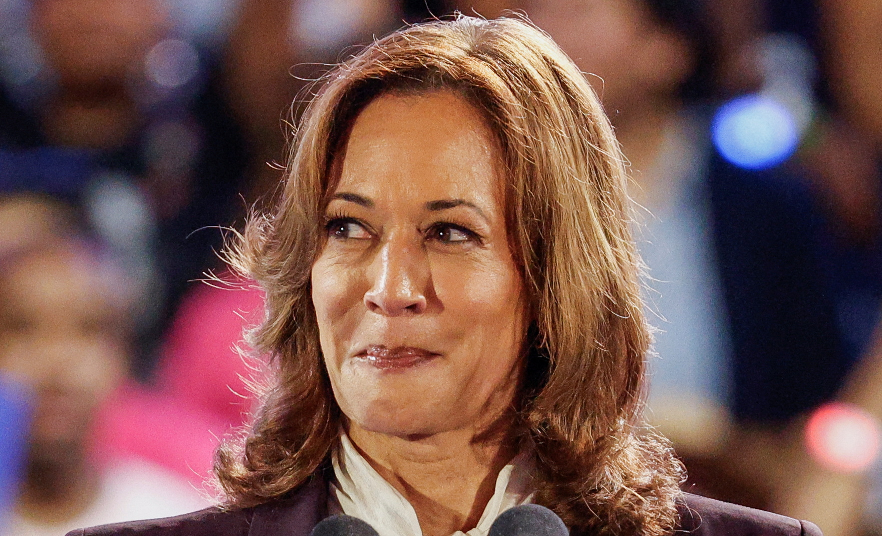 Democratic presidential nominee U.S. Vice President Kamala Harris reacts during her campaign rally with singer Beyonce, in Houston, Texas, U.S., October 25, 2024. REUTERS/Marco Bello