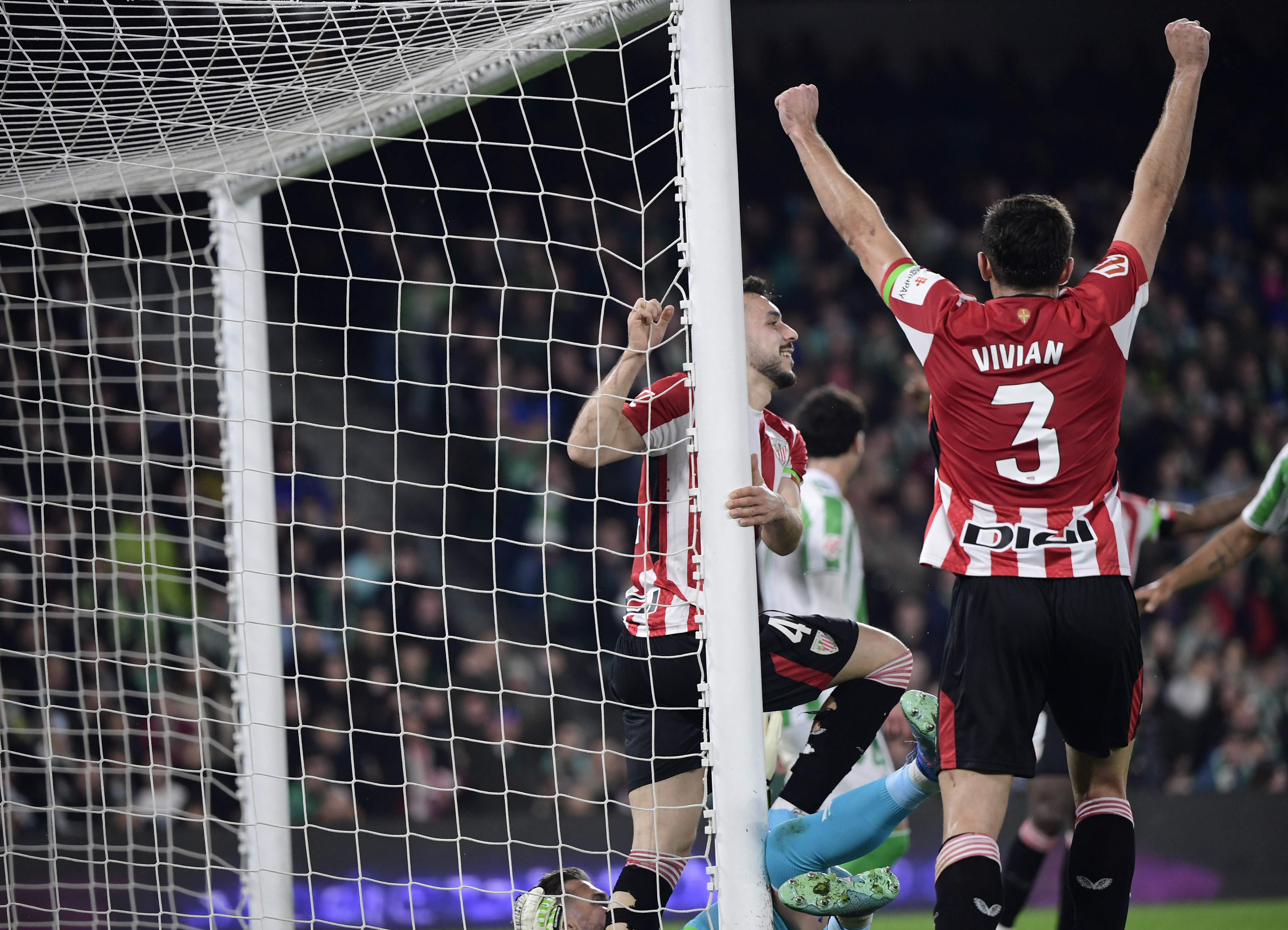 Athletic Bilbao's Spanish defender #04 Aitor Paredes celebrates scoring his team's first goal during the Spanish league football match between Real Betis and Athletic Club Bilbao at the Benito Villamarin stadium in Seville on February 2, 2025. (Photo by CRISTINA QUICLER / AFP)