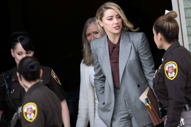 How much money would Amber Heard have to pay Johnny Depp if she loses the trial?