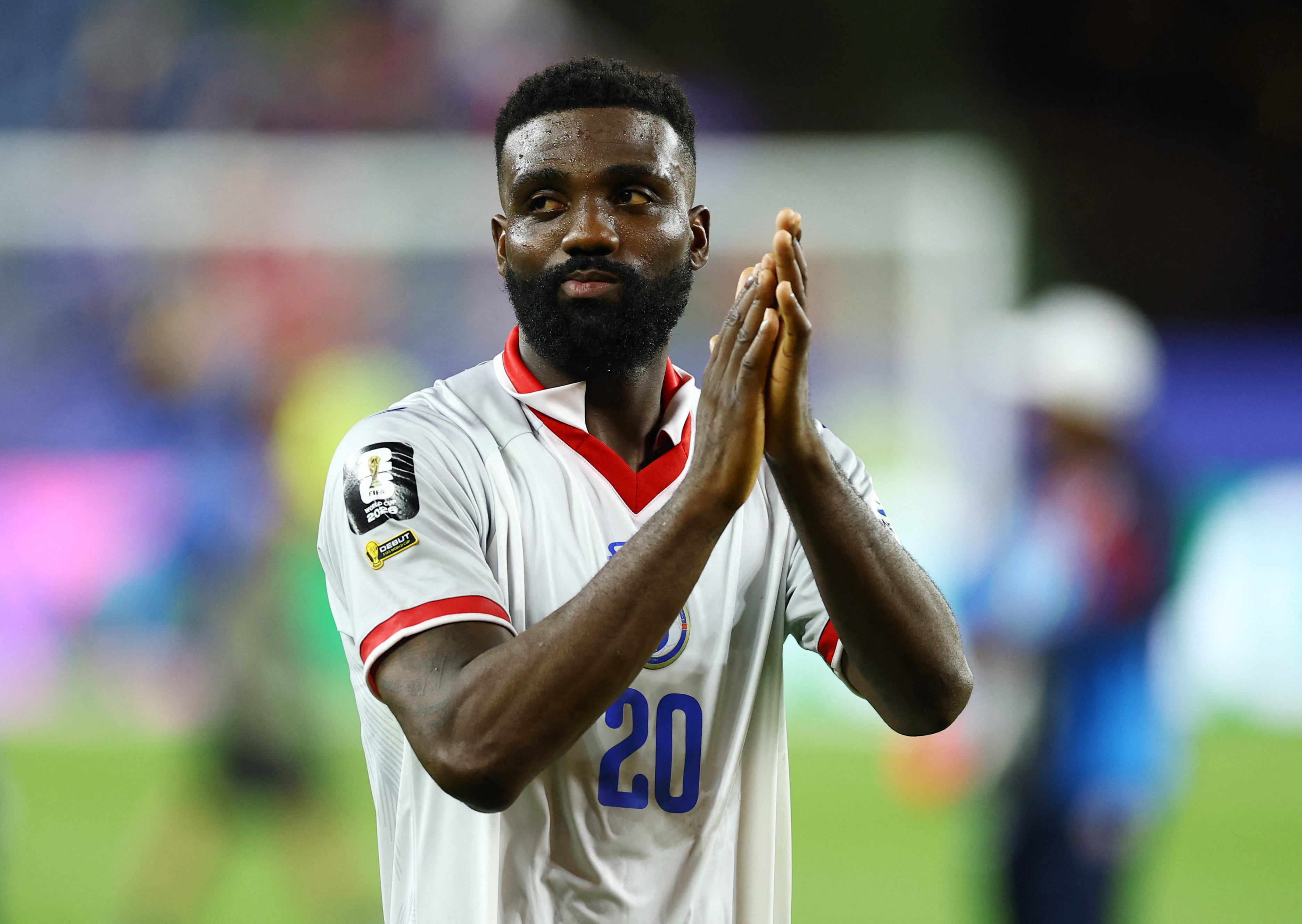 Soccer Football - FIFA World Cup 2026 - Group C - Haiti v Scotland - Boston Stadium, Foxborough, Massachusetts, U.S. - June 13, 2026 Haiti's Frantzdy Pierrot applauds fans after the match REUTERS/Peter Cziborra