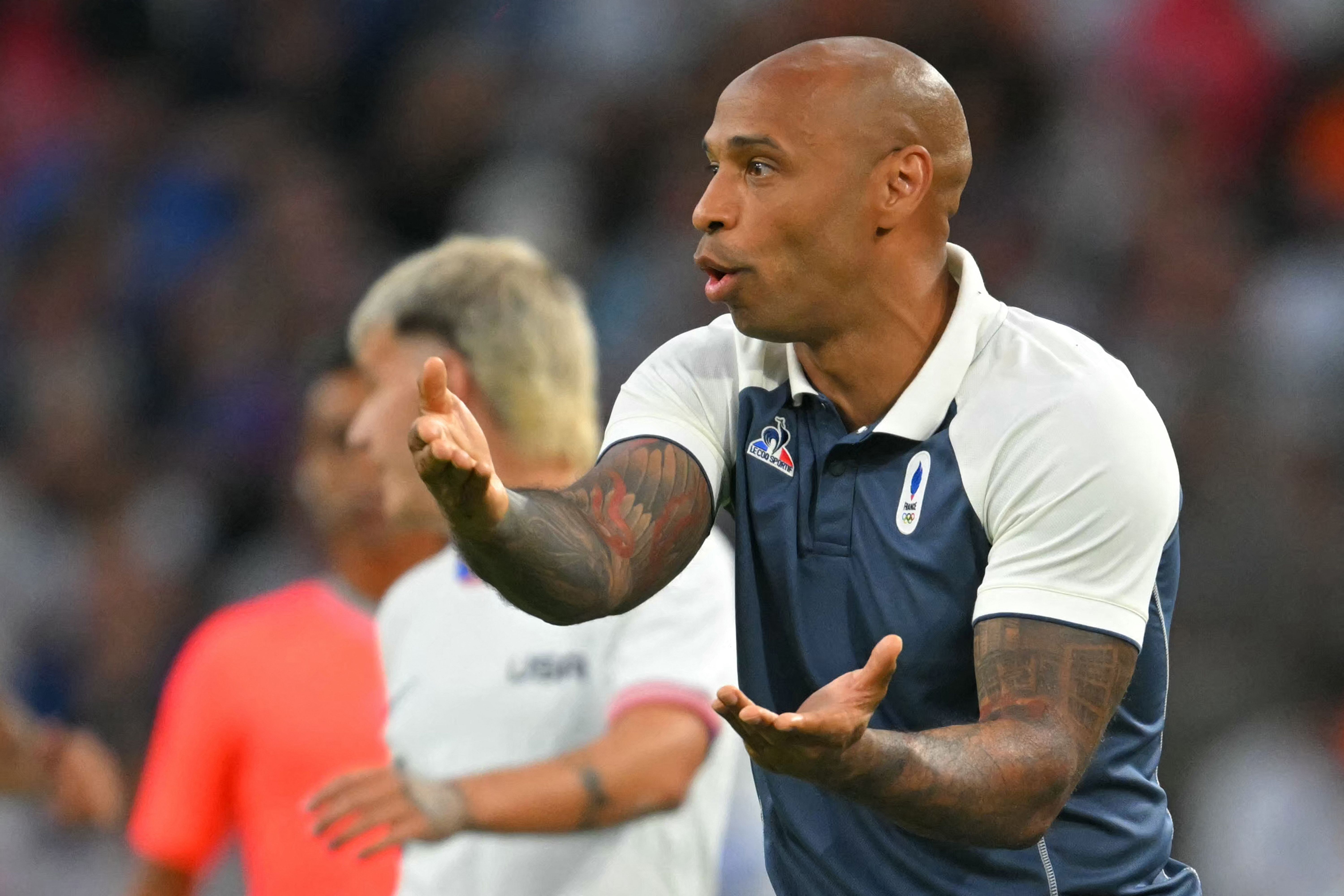 France's coach Thierry Henry gestures during the men's group A football match between France and the USA as part of the Paris 2024 Olympic Games at the Marseille Stadium in Marseille on July 24, 2024. (Photo by NICOLAS TUCAT / AFP)