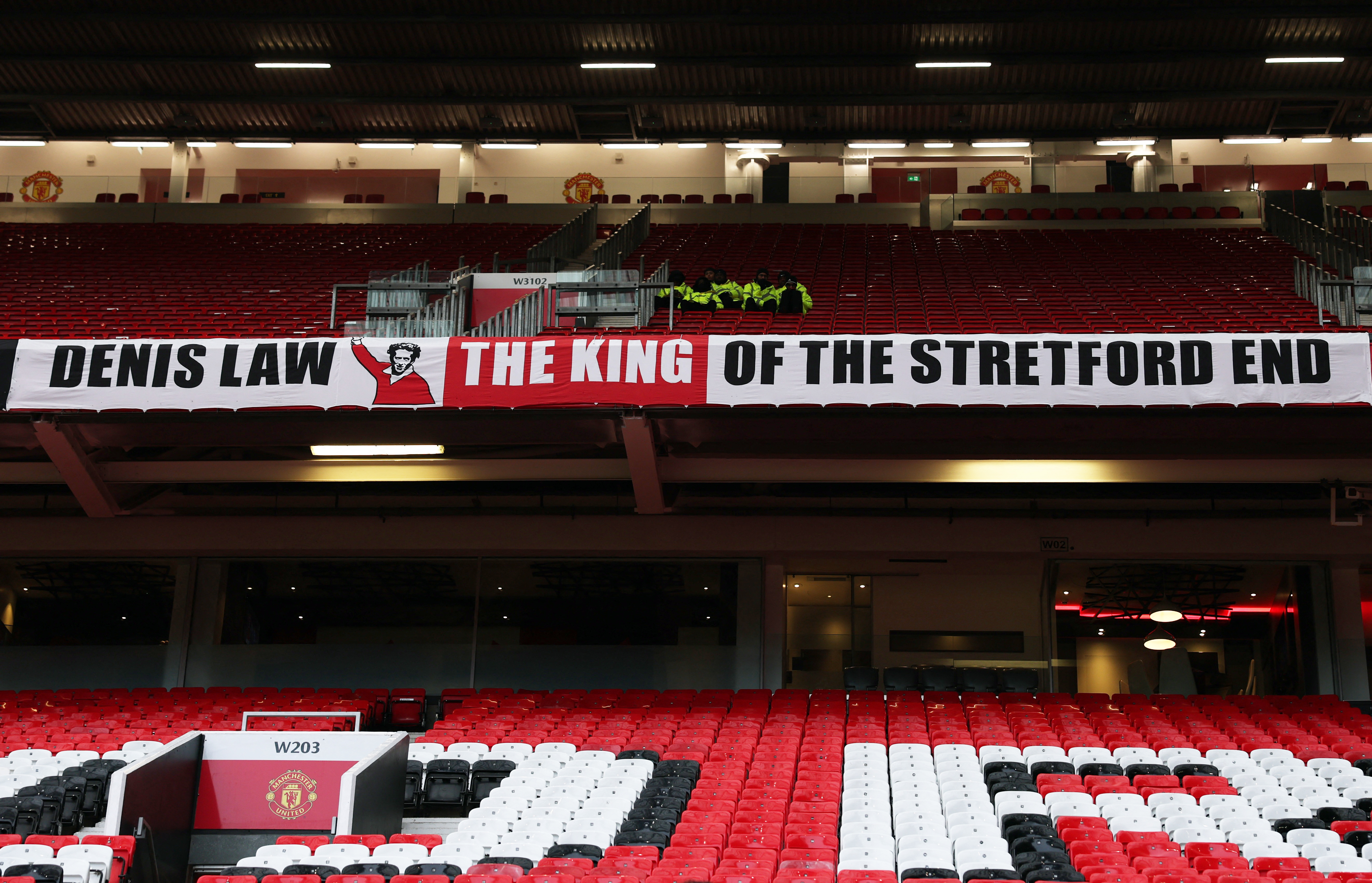 Soccer Football - Premier League - Manchester United v Brighton & Hove Albion - Old Trafford, Manchester, Britain - January 19, 2025 General view of a banner in memory of former Manchester United player Denis Law REUTERS/Phil Noble EDITORIAL USE ONLY. NO USE WITH UNAUTHORIZED AUDIO, VIDEO, DATA, FIXTURE LISTS, CLUB/LEAGUE LOGOS OR 'LIVE' SERVICES. ONLINE IN-MATCH USE LIMITED TO 120 IMAGES, NO VIDEO EMULATION. NO USE IN BETTING, GAMES OR SINGLE CLUB/LEAGUE/PLAYER PUBLICATIONS. PLEASE CONTACT YOUR ACCOUNT REPRESENTATIVE FOR FURTHER DETAILS..