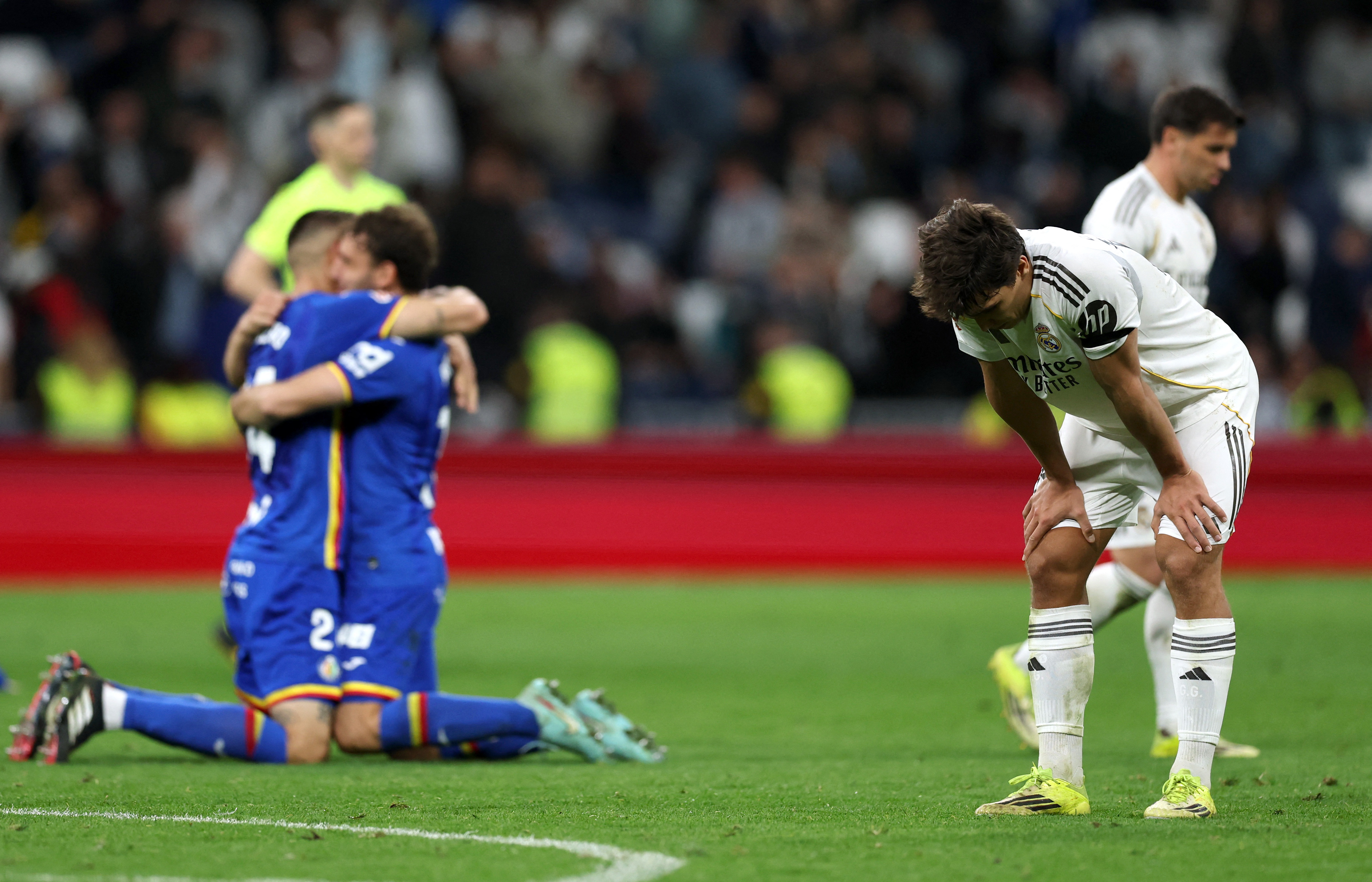 Soccer Football - LaLiga - Real Madrid v Getafe - Santiago Bernabeu, Madrid, Spain - March 2, 2026 Real Madrid's Gonzalo Garcia looks dejected after the match REUTERS/Violeta Santos Moura