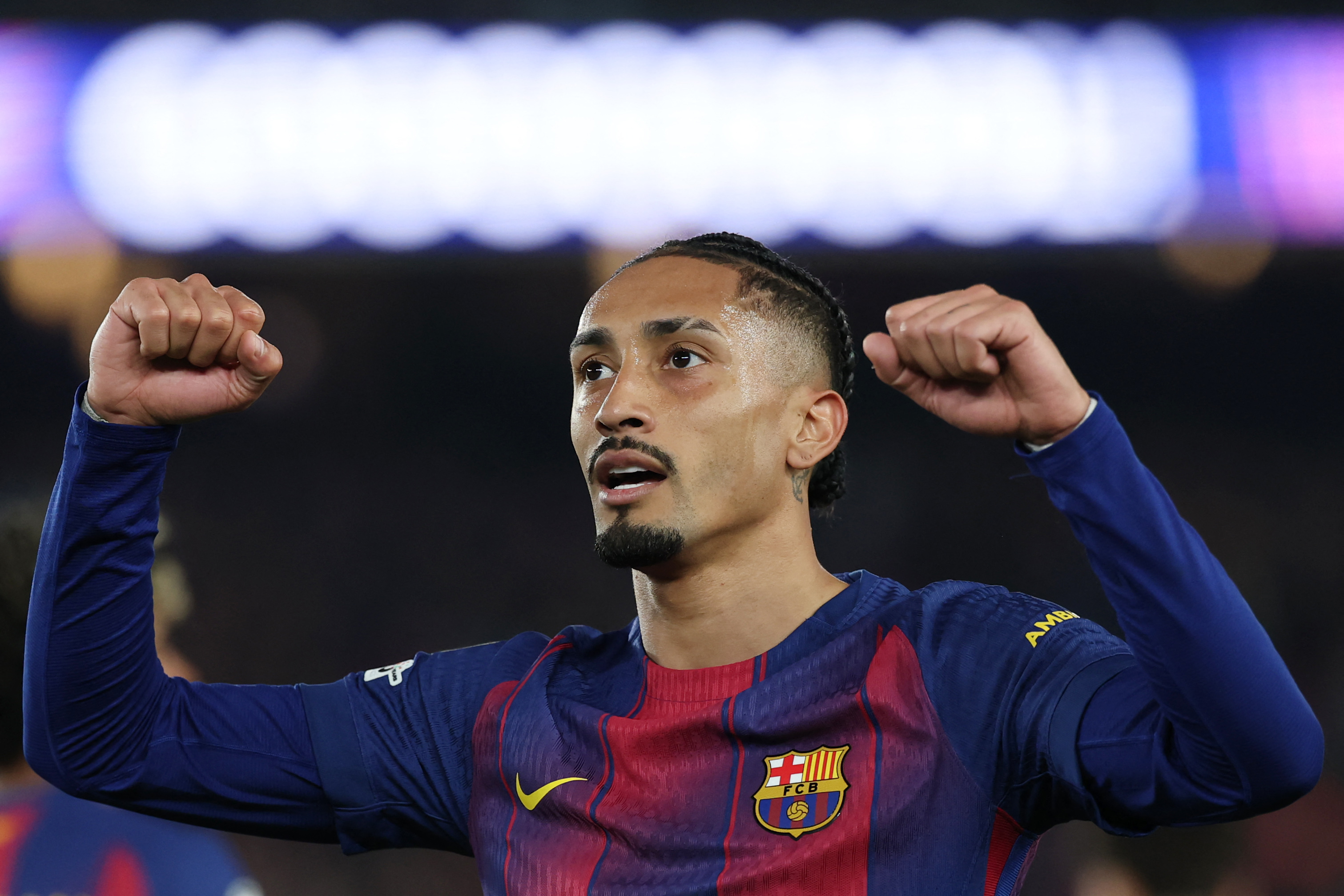 Barcelona's Brazilian forward #11 Raphinha celebrates scoring his team's seventh goal during the UEFA Champions League last 16 second leg football match between FC Barcelona and Newcastle United at the Camp Nou stadium in Barcelona, on March 18, 2026. (Photo by Lluis GENE / AFP)