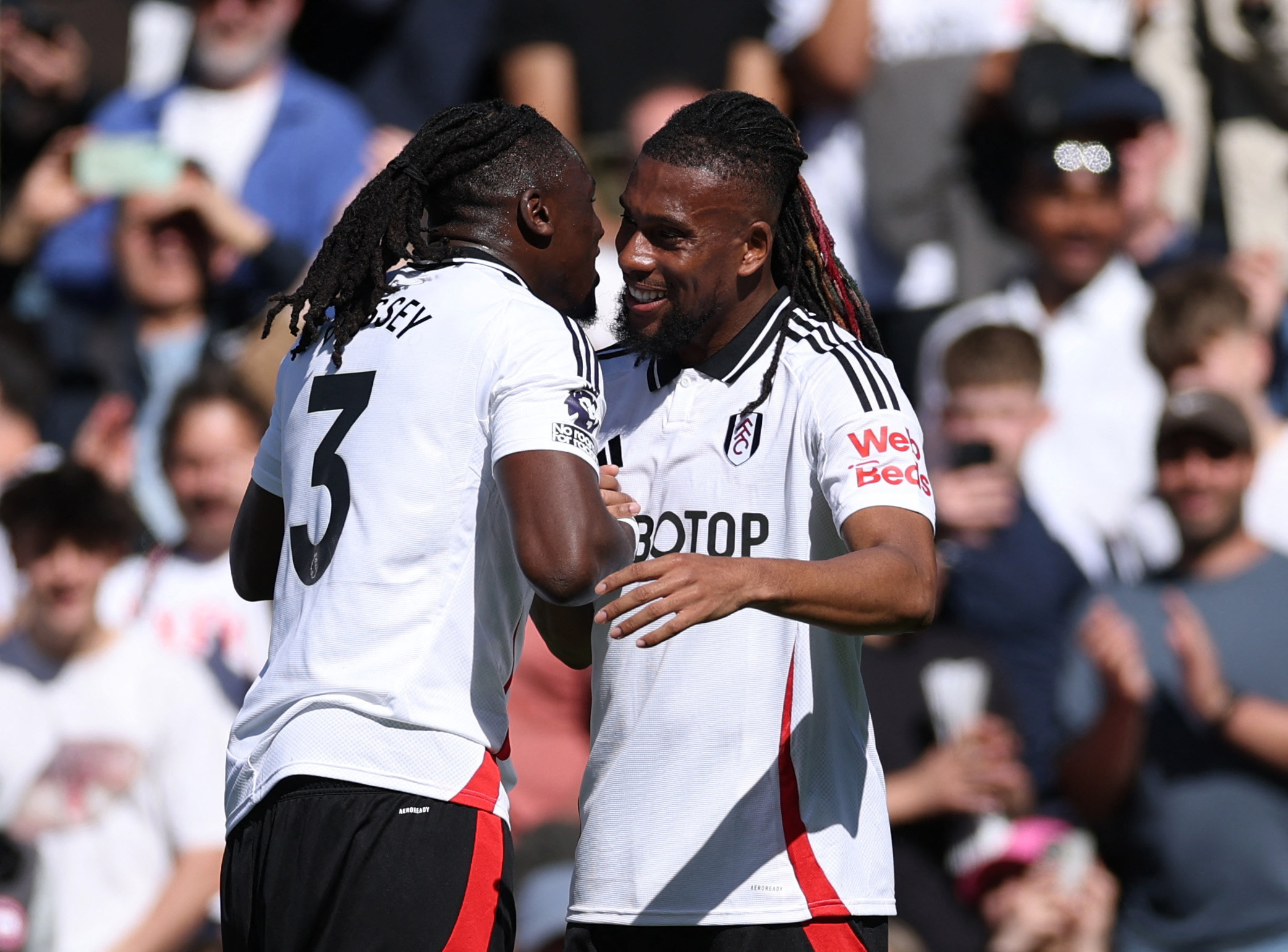 Soccer Football - Premier League - Fulham v Liverpool - Craven Cottage, London, Britain - April 6, 2025 Fulham's Alex Iwobi celebrates scoring their second goal with Fulham's Calvin Bassey Action Images via Reuters/John Sibley EDITORIAL USE ONLY. NO USE WITH UNAUTHORIZED AUDIO, VIDEO, DATA, FIXTURE LISTS, CLUB/LEAGUE LOGOS OR 'LIVE' SERVICES. ONLINE IN-MATCH USE LIMITED TO 120 IMAGES, NO VIDEO EMULATION. NO USE IN BETTING, GAMES OR SINGLE CLUB/LEAGUE/PLAYER PUBLICATIONS. PLEASE CONTACT YOUR ACCOUNT REPRESENTATIVE FOR FURTHER DETAILS..