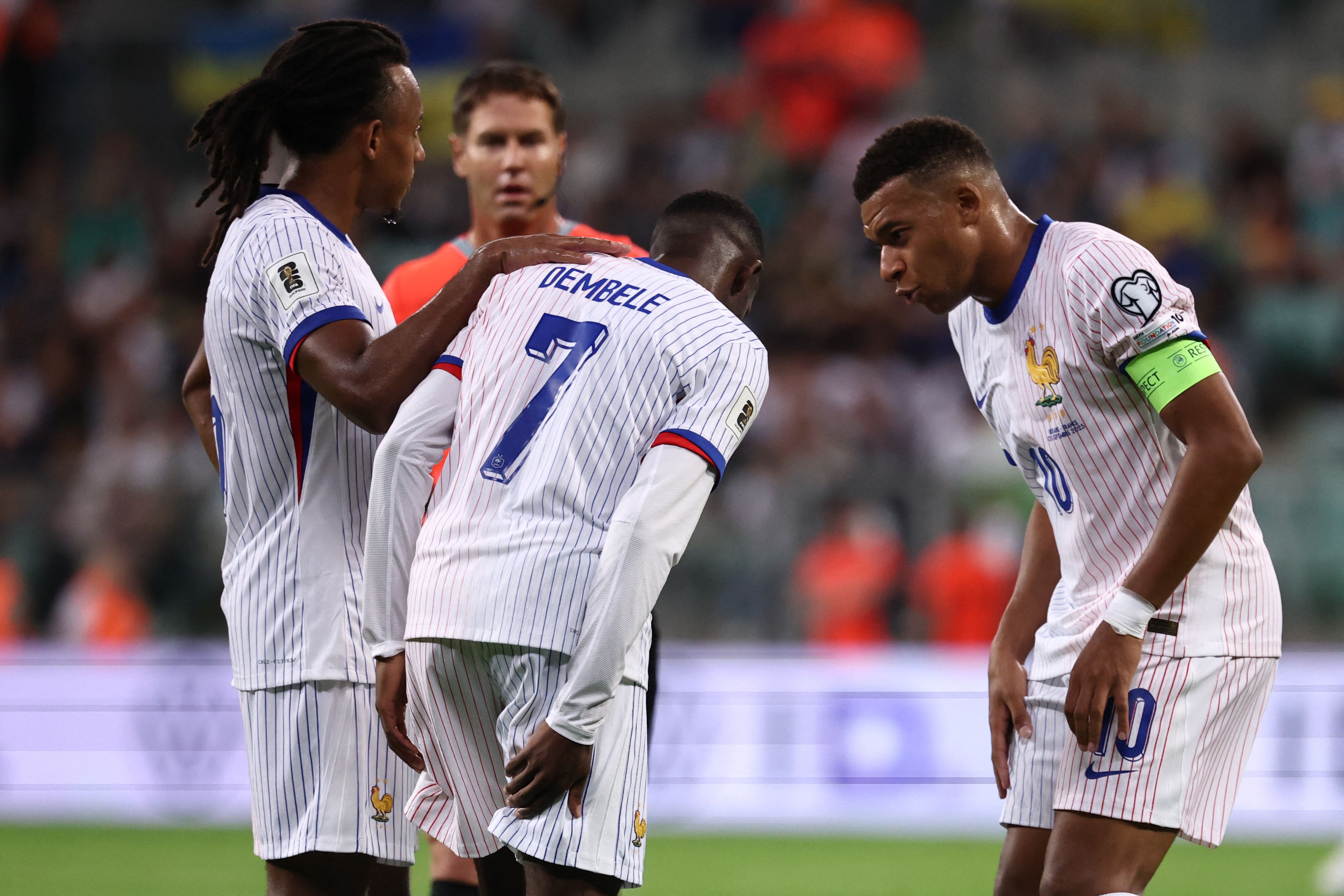 France's forward #07 Ousmane Dembele reacts after injury during the 2026 World Cup qualifiers Europe zone group D football match between Ukraine and France, on September 5, 2025 in Wroclaw, Poland. (Photo by FRANCK FIFE / AFP)