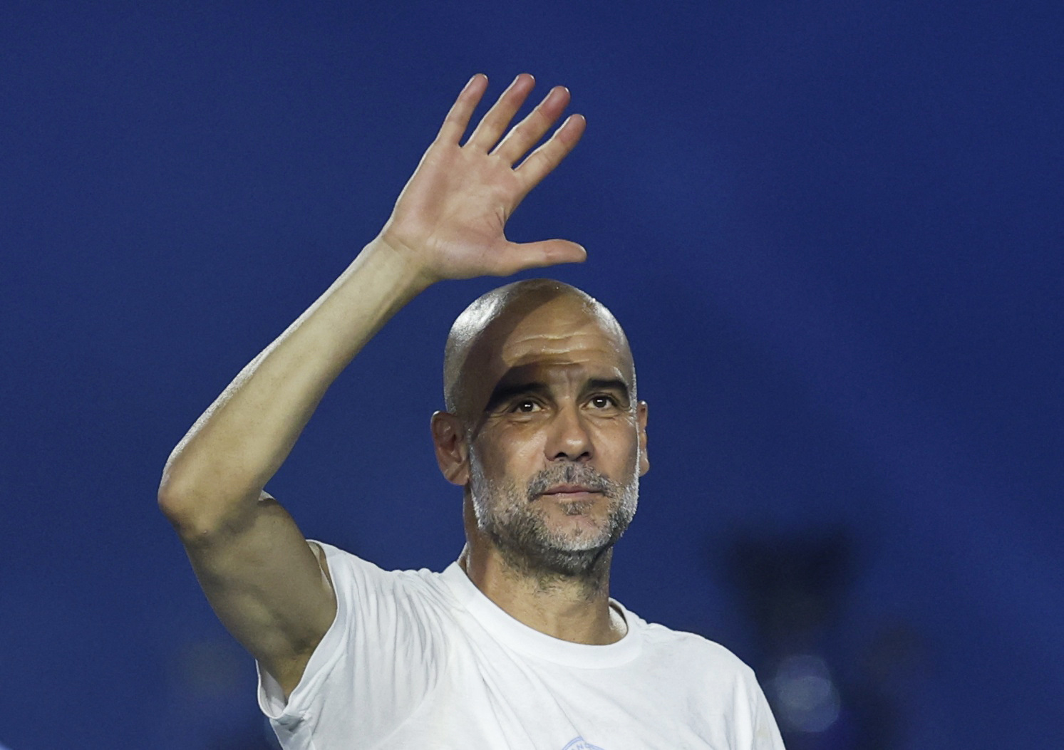Soccer Football - Manchester City FA Cup and Carabao Cup Victory Parade - Manchester, Britain - May 25, 2026 Manchester City manager Pep Guardiola celebrates after the victory parade Action Images via Reuters/Jason Cairnduff