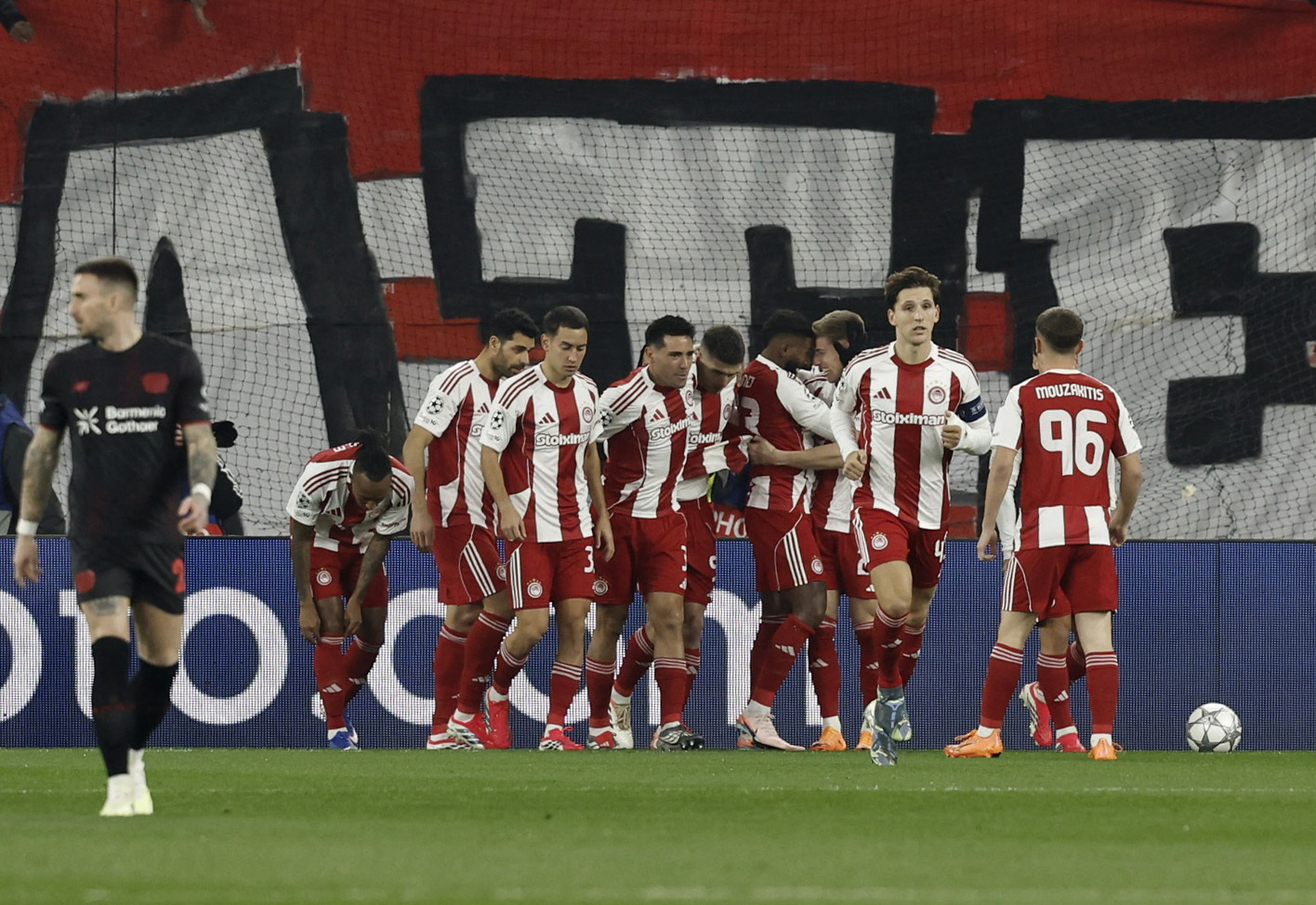 Soccer Football - UEFA Champions League - Olympiacos v Bayer Leverkusen - Karaiskakis Stadium, Piraeus, Greece - January 20, 2026 Olympiacos' Costinha celebrates scoring their first goal with teammates REUTERS/Louiza Vradi