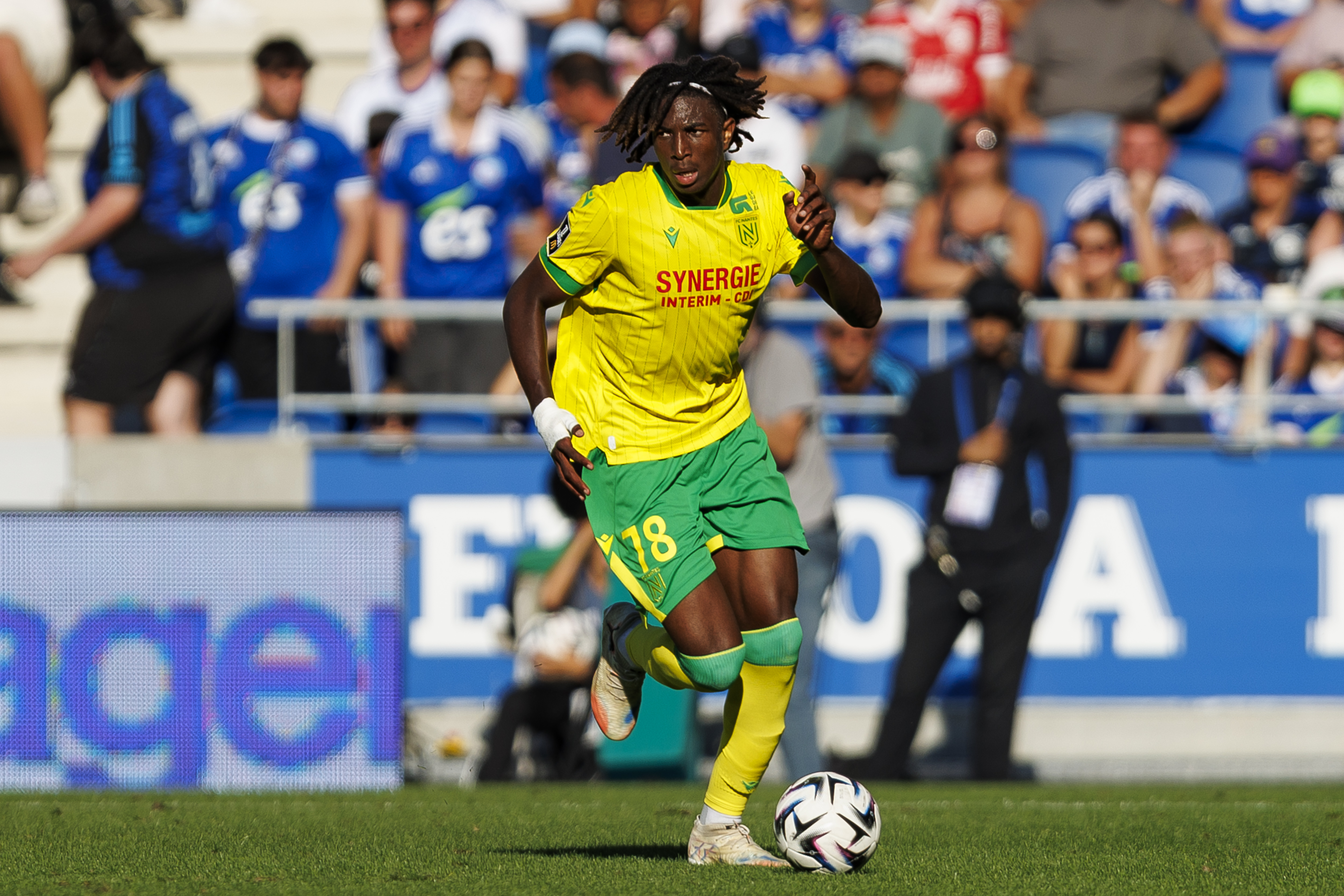 STRASBOURG, FRANCE - AUGUST 24: Tylel Tati of FC Nantes runs with the ball during the Ligue 1 McDonald's match between RC Strasbourg Alsace and FC Nantes at Stade de la Meinau on August 24, 2025 in Strasbourg, France. (Photo by Sathire Kelpa/Eurasia Sport Images/Getty Images)