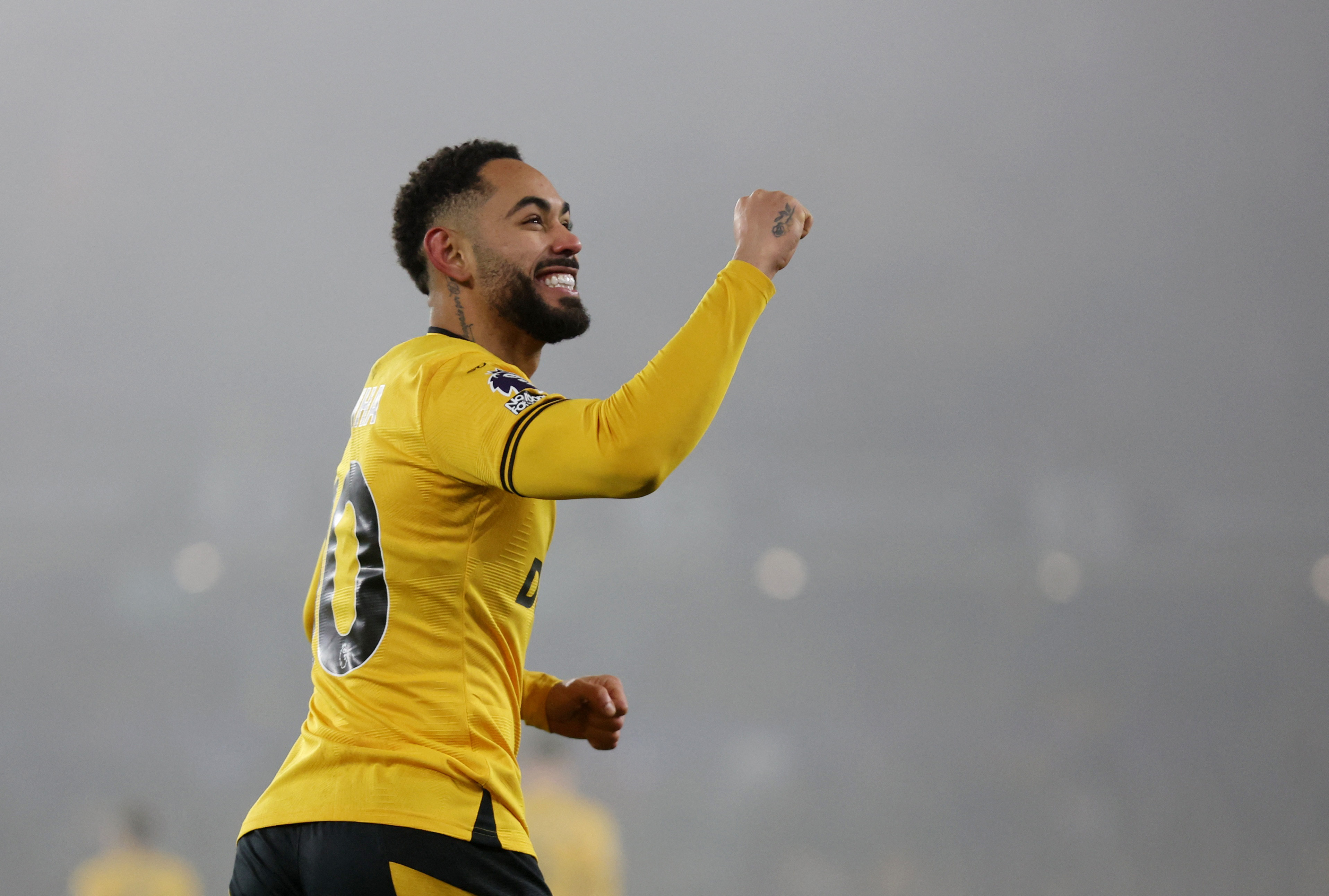 Soccer Football - Premier League - Wolverhampton Wanderers v Manchester United - Molineux Stadium, Wolverhampton, Britain - December 26, 2024 Wolverhampton Wanderers' Matheus Cunha celebrates scoring their first goal REUTERS/Chris Radburn EDITORIAL USE ONLY. NO USE WITH UNAUTHORIZED AUDIO, VIDEO, DATA, FIXTURE LISTS, CLUB/LEAGUE LOGOS OR 'LIVE' SERVICES. ONLINE IN-MATCH USE LIMITED TO 120 IMAGES, NO VIDEO EMULATION. NO USE IN BETTING, GAMES OR SINGLE CLUB/LEAGUE/PLAYER PUBLICATIONS. PLEASE CONTACT YOUR ACCOUNT REPRESENTATIVE FOR FURTHER DETAILS..