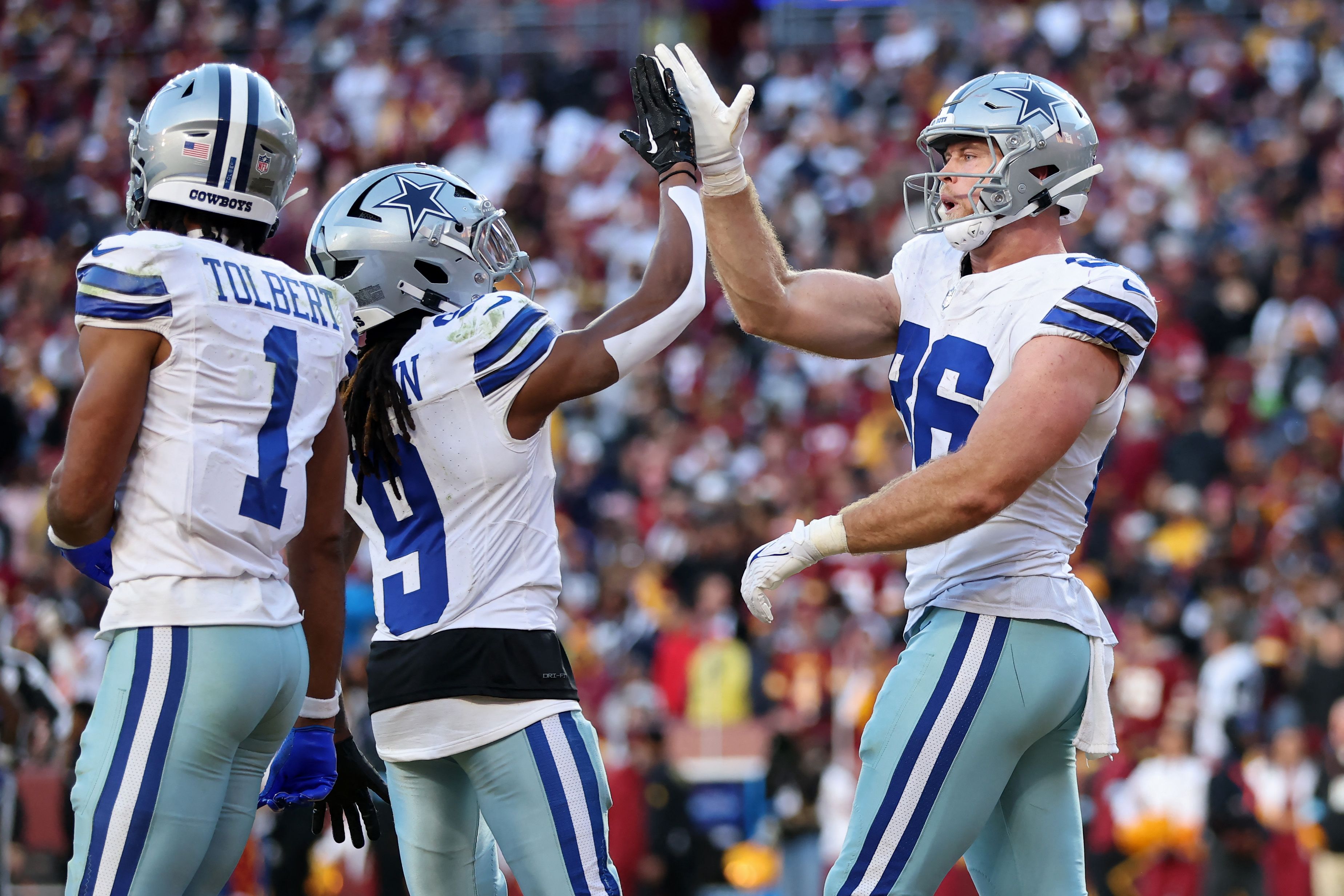 LANDOVER, MARYLAND - NOVEMBER 24: Luke Schoonmaker #86 of the Dallas Cowboys celebrates a fourth quarter touchdown against the Washington Commanders at Northwest Stadium on November 24, 2024 in Landover, Maryland.   Patrick Smith/Getty Images/AFP (Photo by Patrick Smith / GETTY IMAGES NORTH AMERICA / Getty Images via AFP)