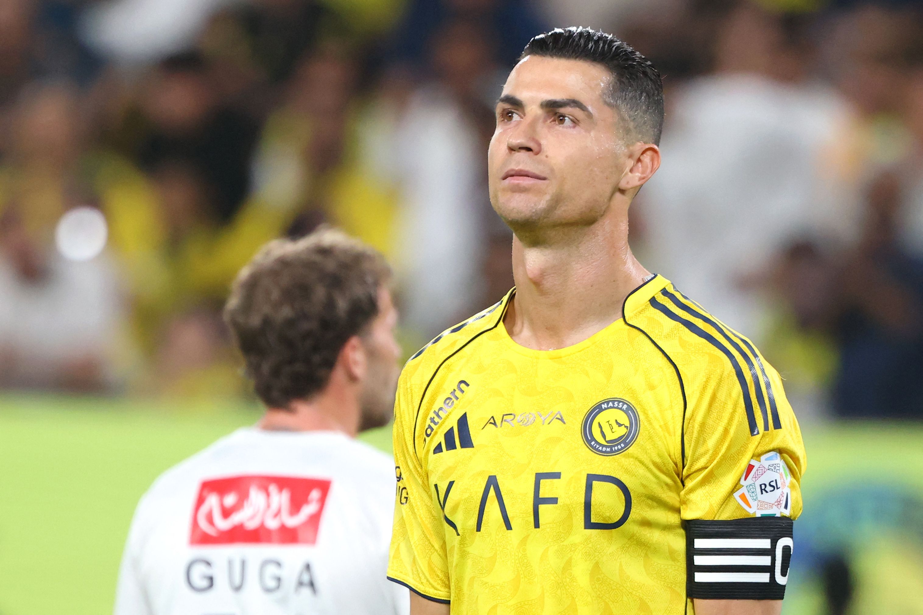 Al Nassr's Portuguese forward #07 Cristiano Ronaldo (R) reacts during the Saudi Pro League football match between Al-Nassr and Al-Najma at the Al-Awwal Park Stadium in Riyadh on April 3, 2026. (Photo by Fayez Nureldine / AFP)