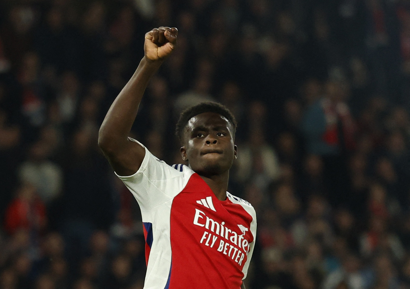 Soccer Football - Champions League - Semi Final - Second Leg - Paris St Germain v Arsenal - Parc des Princes, Paris, France - May 7, 2025 Arsenal's Bukayo Saka celebrates scoring their first goal Action Images via Reuters/Peter Cziborra