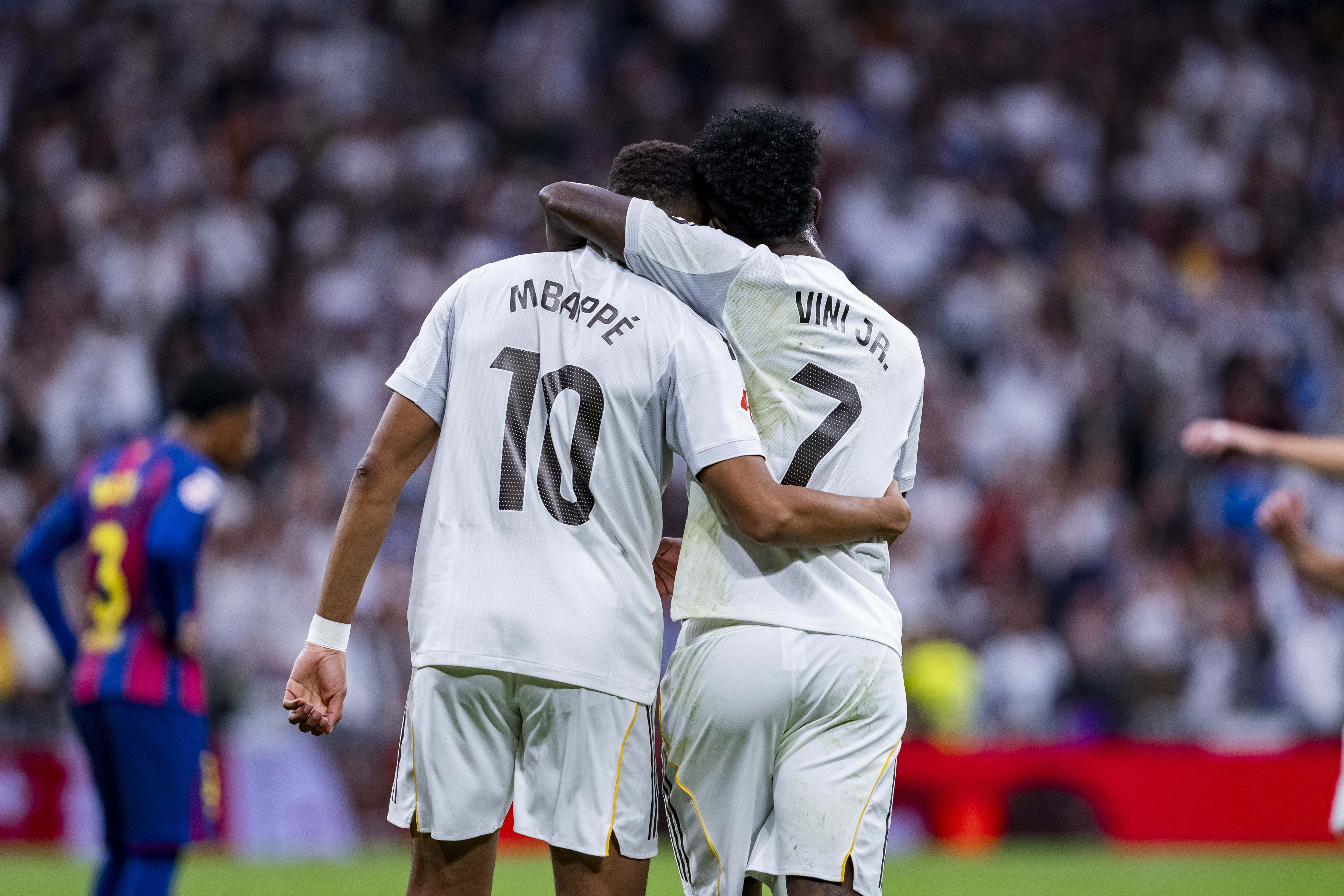 Players of Real Madrid (from left to right) Kylian Mbappe and Vinicius Junior celebrate a goal during the LaLiga EA Sports football match between Real Madrid CF and FC Barcelona at Estadio Santiago Bernabeu in Madrid, Spain, on October 26, 2025. (Photo by Alberto Gardin/NurPhoto via Getty Images)