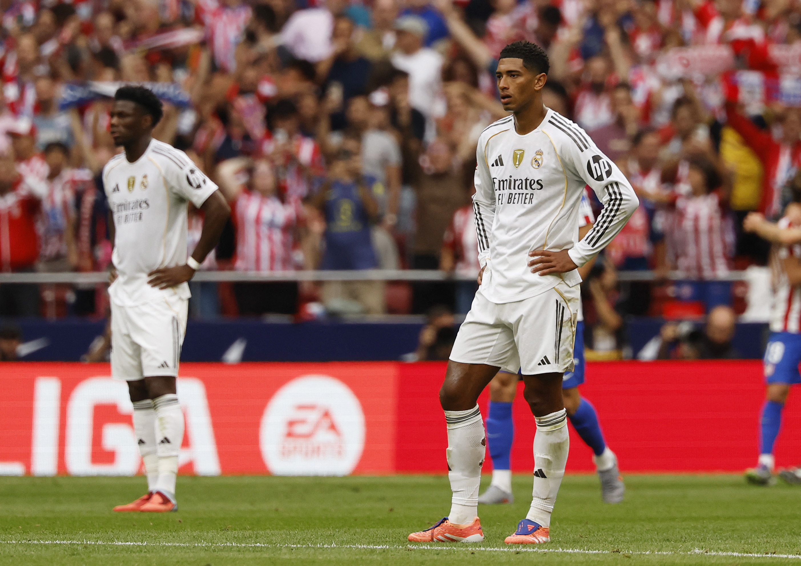 Soccer Football - LaLiga - Atletico Madrid v Real Madrid - Riyadh Air Metropolitano, Madrid, Spain - September 27, 2025 Real Madrid's Jude Bellingham looks dejected after Atletico Madrid's Julian Alvarez scores their fourth goal from a free kick REUTERS/Susana Vera