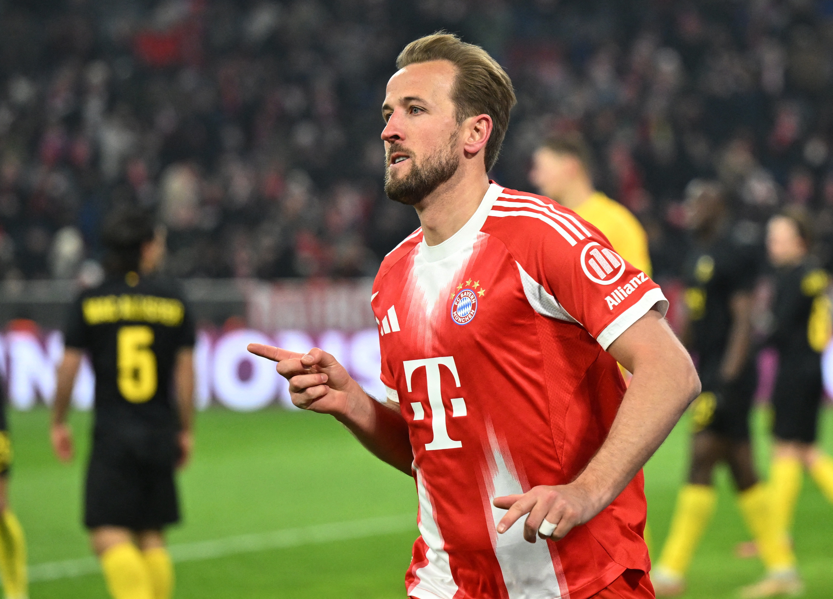 Soccer Football - UEFA Champions League - Bayern Munich v Union Saint-Gilloise - Allianz Arena, Munich, Germany - January 21, 2026 Bayern Munich's Harry Kane celebrates scoring their first goal REUTERS/Angelika Warmuth