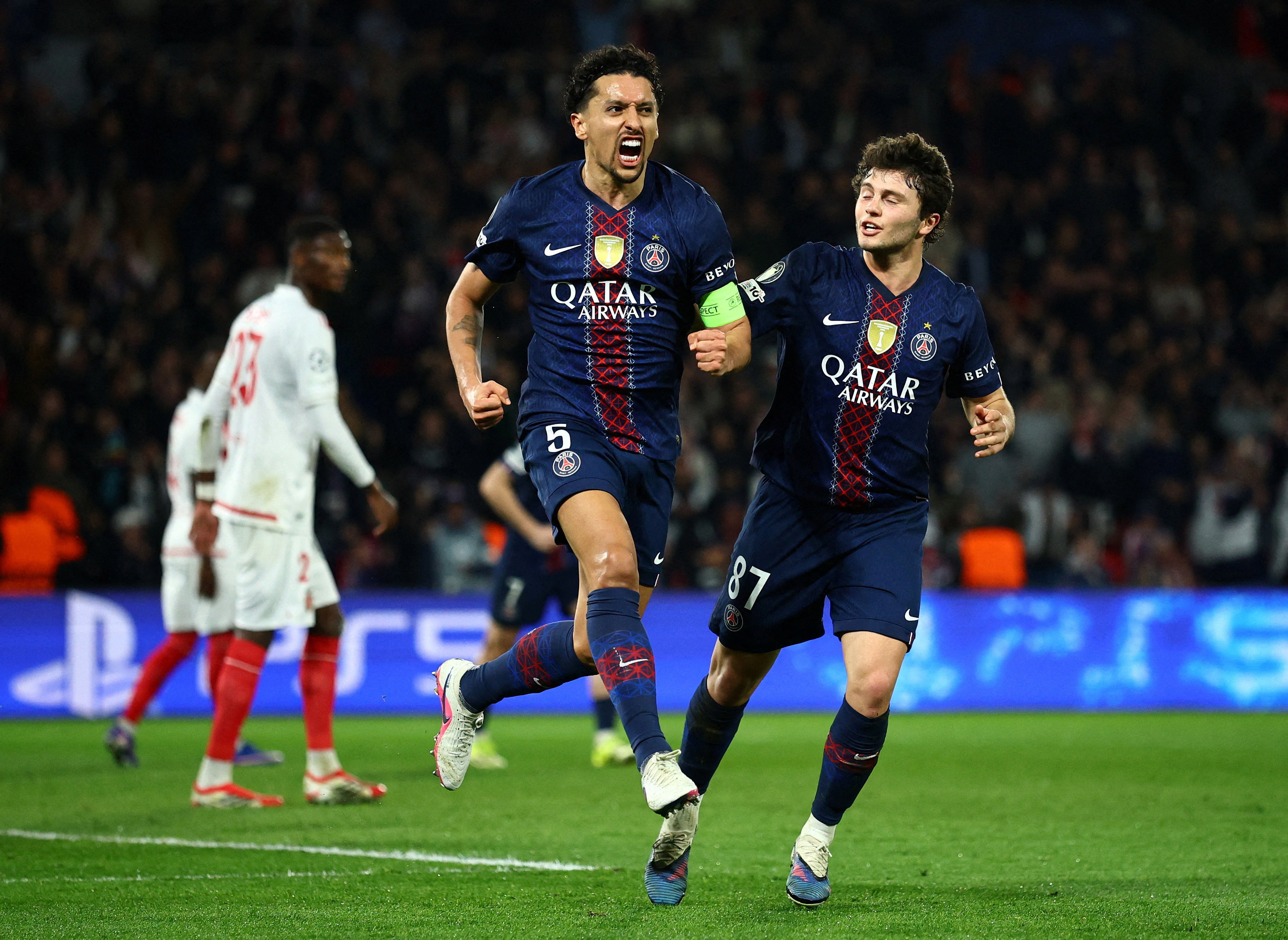Soccer Football - UEFA Champions League - Play Off - Second Leg - Paris St Germain v AS Monaco - Parc des Princes, Paris, France - February 25, 2026 Paris St Germain's Marquinhos celebrates scoring their first goal with Joao Neves REUTERS/Sarah Meyssonnier     TPX IMAGES OF THE DAY