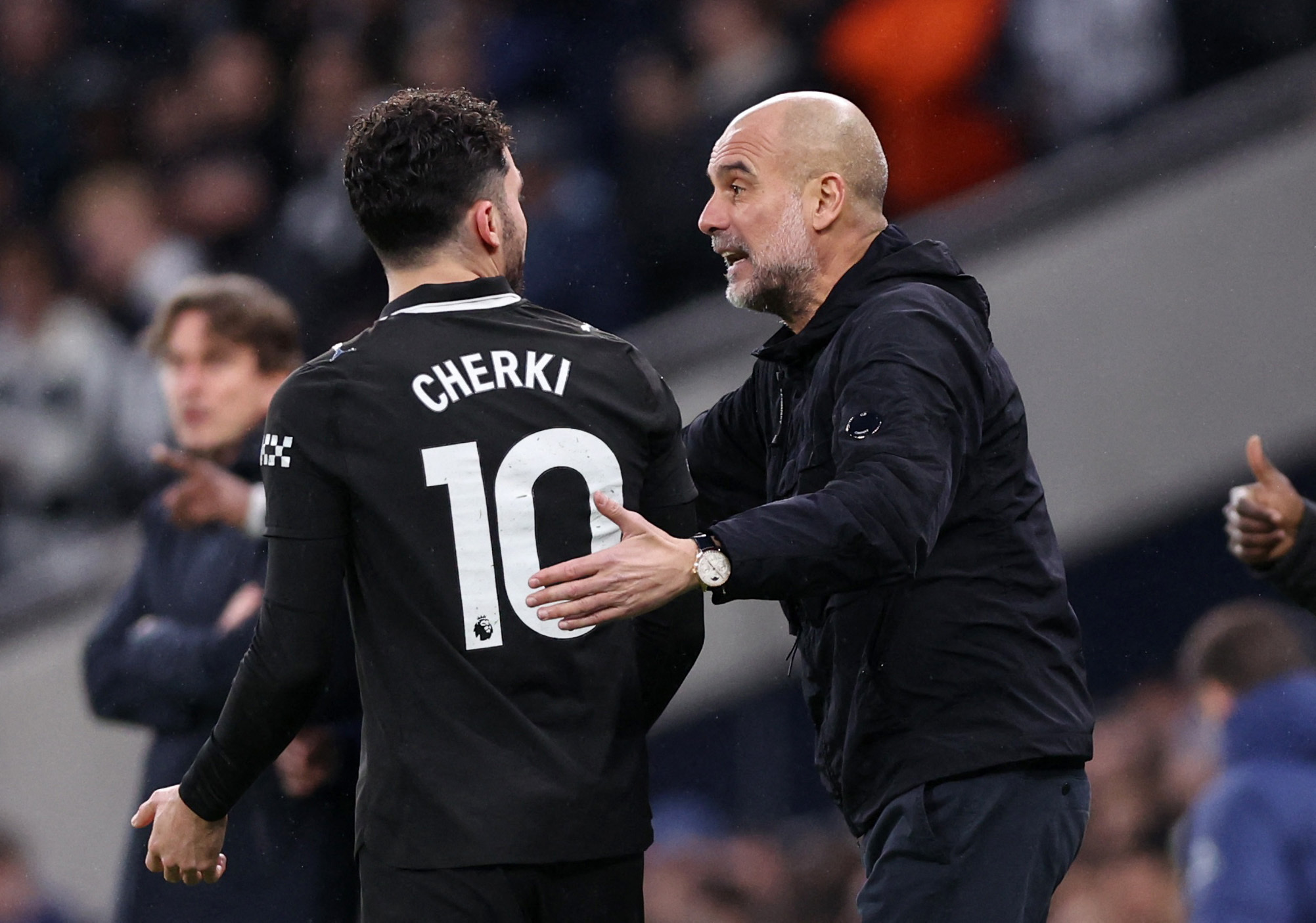 Soccer Football - Premier League - Tottenham Hotspur v Manchester City - Tottenham Hotspur Stadium, London, Britain - February 1, 2026 Manchester City manager Pep Guardiola remonstrates to Manchester City's Rayan Cherki REUTERS/David Klein EDITORIAL USE ONLY. NO USE WITH UNAUTHORIZED AUDIO, VIDEO, DATA, FIXTURE LISTS, CLUB/LEAGUE LOGOS OR 'LIVE' SERVICES. ONLINE IN-MATCH USE LIMITED TO 120 IMAGES, NO VIDEO EMULATION. NO USE IN BETTING, GAMES OR SINGLE CLUB/LEAGUE/PLAYER PUBLICATIONS. PLEASE CONTACT YOUR ACCOUNT REPRESENTATIVE FOR FURTHER DETAILS..