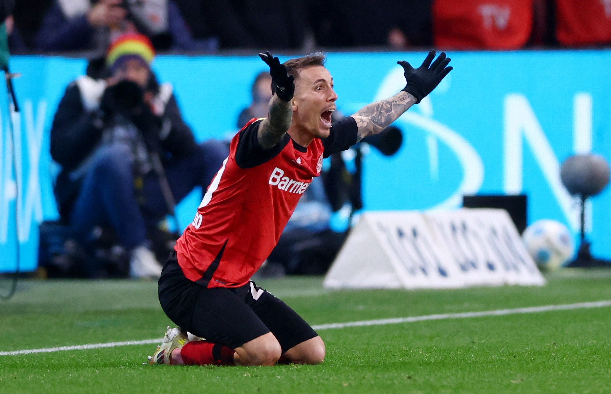 Soccer Football - Bundesliga - Bayer Leverkusen v Bayern Munich - BayArena, Leverkusen, Germany - February 15, 2025 Bayer Leverkusen's Alex Grimaldo reacts REUTERS/Thilo Schmuelgen DFL REGULATIONS PROHIBIT ANY USE OF PHOTOGRAPHS AS IMAGE SEQUENCES AND/OR QUASI-VIDEO.